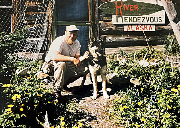Photo courtesy of the Mona Painter Collection 
William “Big Bill” Roberts, who operated the Russian River Rendezvous in the mid-1950s, poses with his dog near the front door of the lodge.