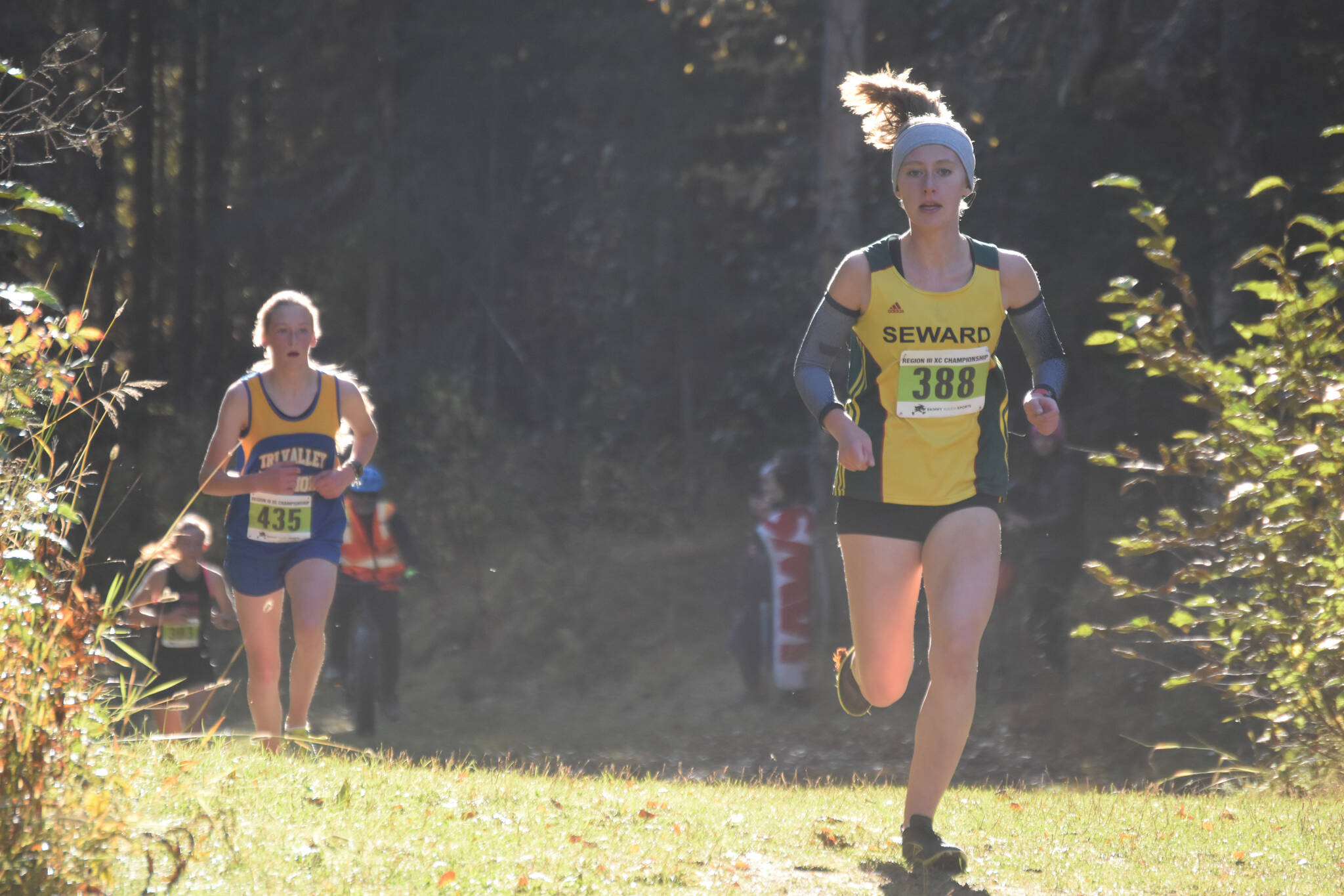 Seward’s Hailey Ingalls leads the Region 3/Division II girls race on Saturday, Oct. 1, 2022 at Tsalteshi Trails just outside of Soldotna, Alaska. (Jake Dye/Peninsula Clarion)