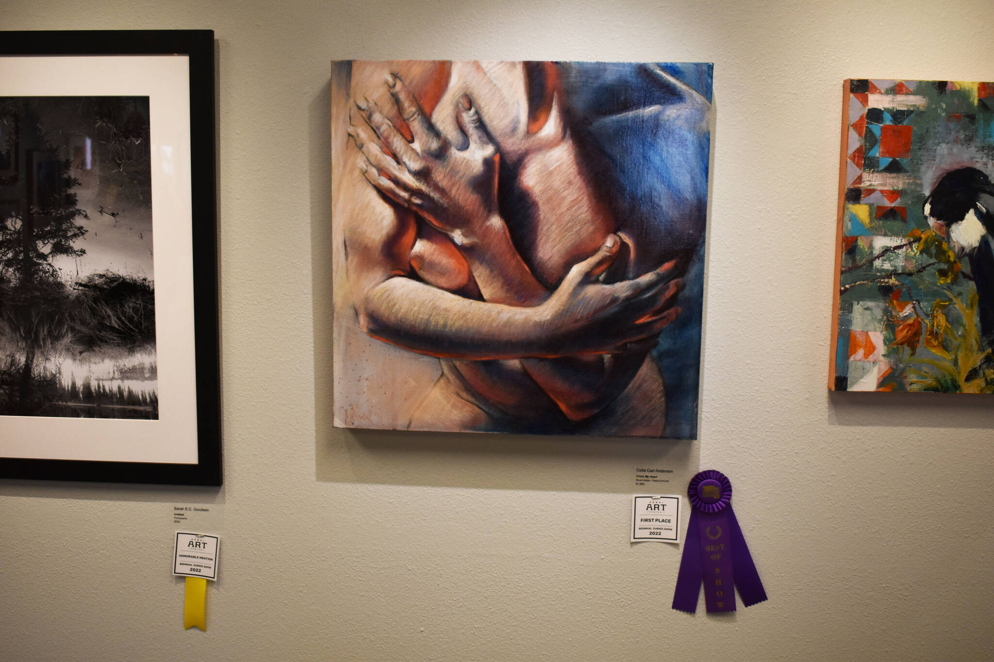 “Cross My Heart,” by Celia Carl Anderson, hangs with its Best of Show ribbon during the opening reception of the Kenai Art Center Biennial Juried Show on Thursday, Oct. 6, 2022, at the Kenai Art Center in Kenai, Alaska. (Jake Dye/Peninsula Clarion)