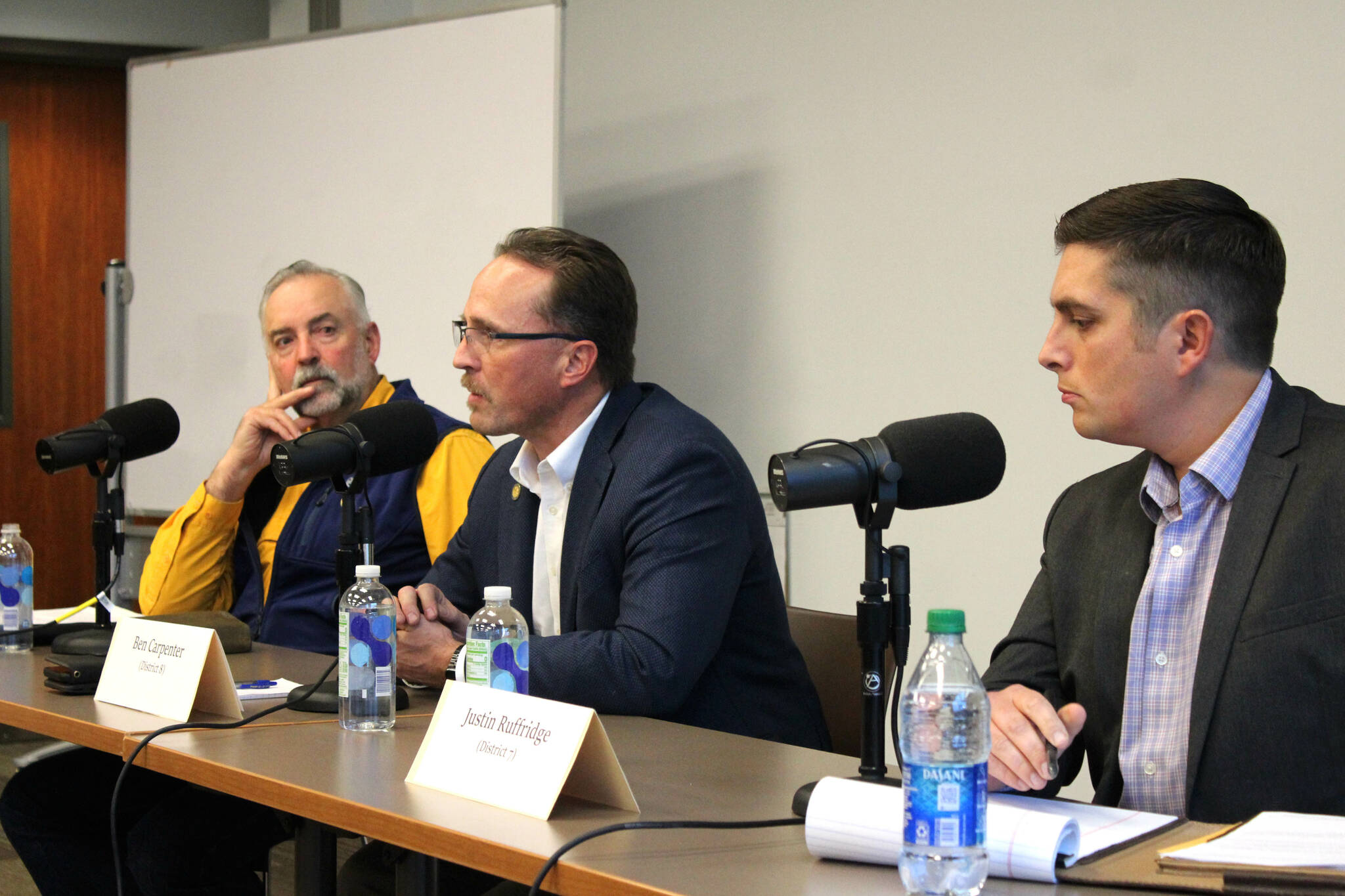 Rep. Ben Carpenter, center, participates in an Alaska State House candidate forum on Monday, Oct. 10, 2022, in Soldotna, Alaska. (Ashlyn O’Hara/Peninsula Clarion)