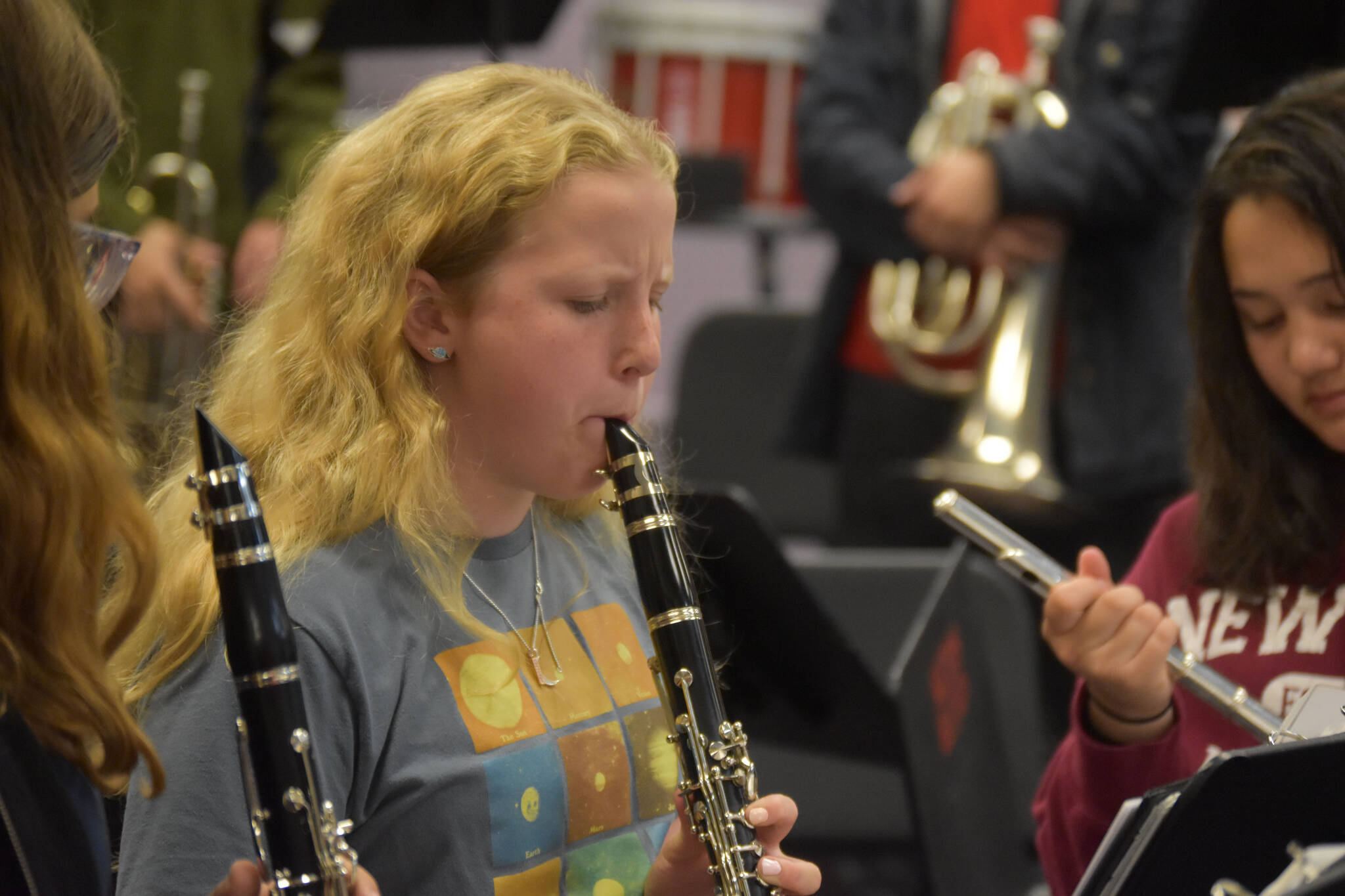 Lexi Somers, clarinet player, hits a tuning note during a KCHS Marching Band practice on Aug. 18, 2022, in Kenai, Alaska. (Jake Dye/Peninsula Clarion)