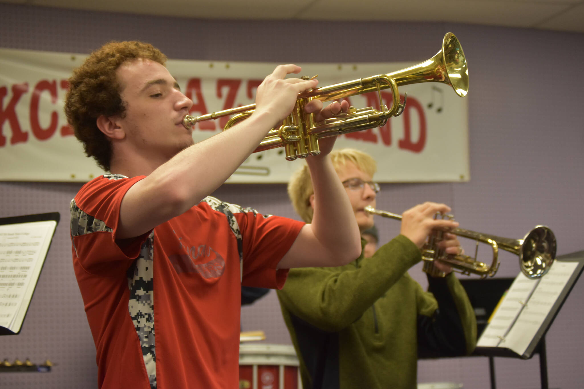 Silas Thibodeau and Dakota Wisnewski rehearse during a KCHS Marching Band practice on Aug. 18, 2022, in Kenai, Alaska. (Jake Dye/Peninsula Clarion)