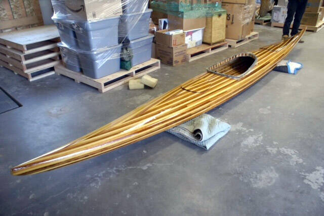 The cedar-built kayak Nate Grinnell built to follow the voyageur’s journey. (Photo by Julie Grinnell)