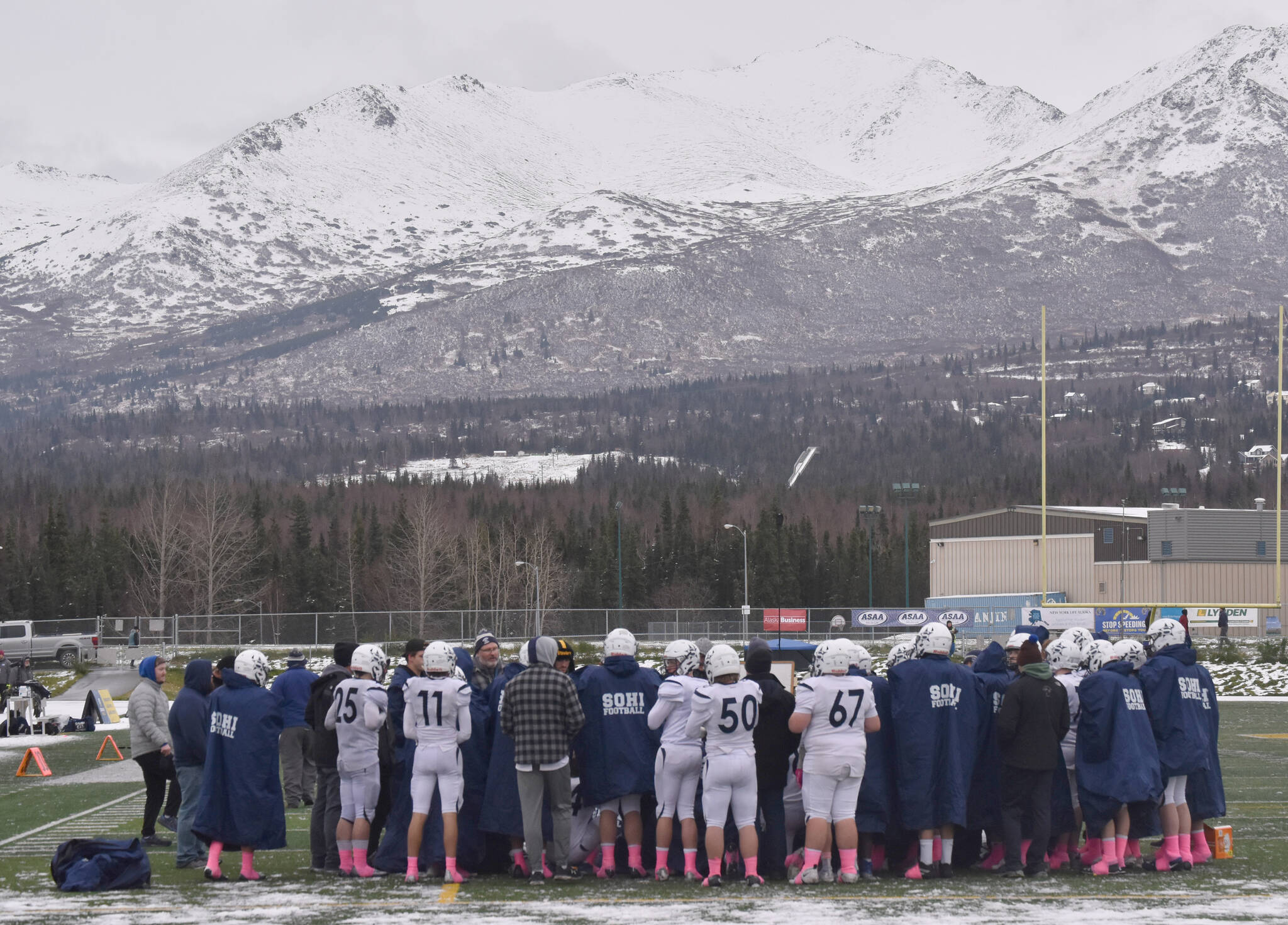 Soldotna head coach Galen Brantley Jr. addresses his team at halftime Saturday, Oct. 15, 2022, in the Division II state championship game at Service High School in Anchorage, Alaska. (Photo by Jeff Helminiak/Peninsula Clarion)