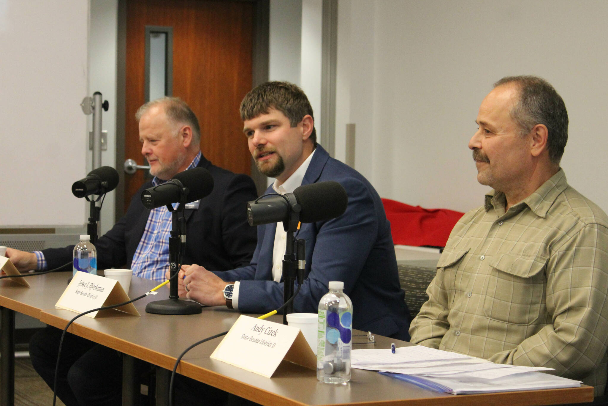 From left: Alaska Senate District D candidates Tuckerman Babcock, Jesse Bjorkman and Andy Cizek participate in a candidate forum at the Soldotna Public Library on Monday, Oct. 17, 2022 in Soldotna, Alaska. (Ashlyn O’Hara/Peninsula Clarion)