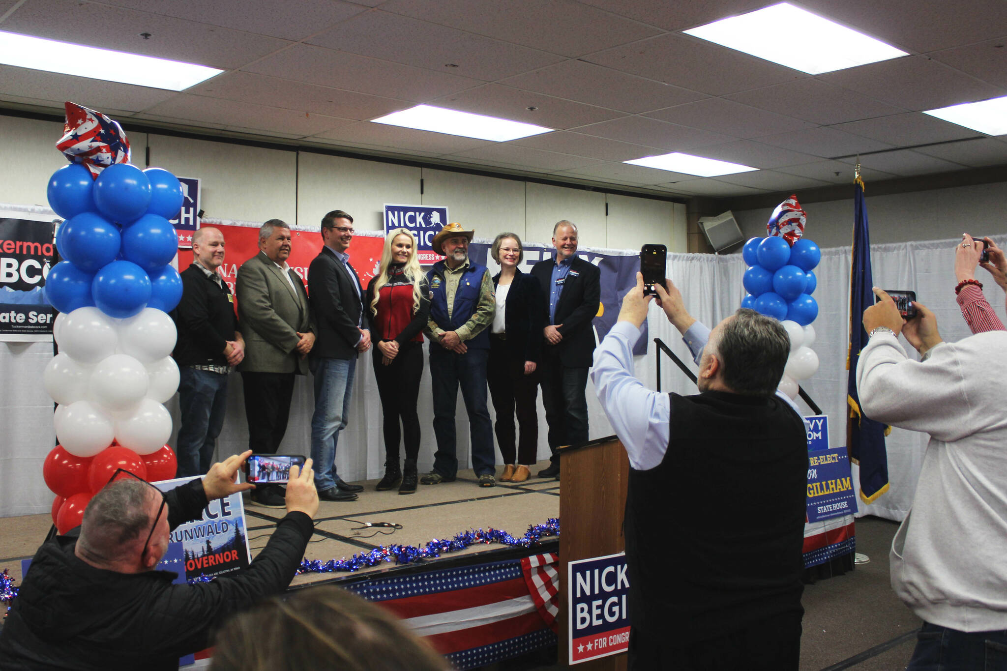 Alaskan Republican candidates pose for a group photo at a “Get Out the Vote” rally at the Soldotna Regional Sports Complex on Tuesday, Oct. 19, 2022, in Soldotna, Alaska. From left: Alaska Senate candidate Heath Smith; gubernatorial candidate Charlie Pierce; U.S. House candidate Nick Begich III; U.S. Senate candidate Kelly Tshibaka; Alaska House Reps. Sarah Vance and Ron Gillham; and Alaska Senate candidate Tuckerman Babcock. (Ashlyn O’Hara/Peninsula Clarion)