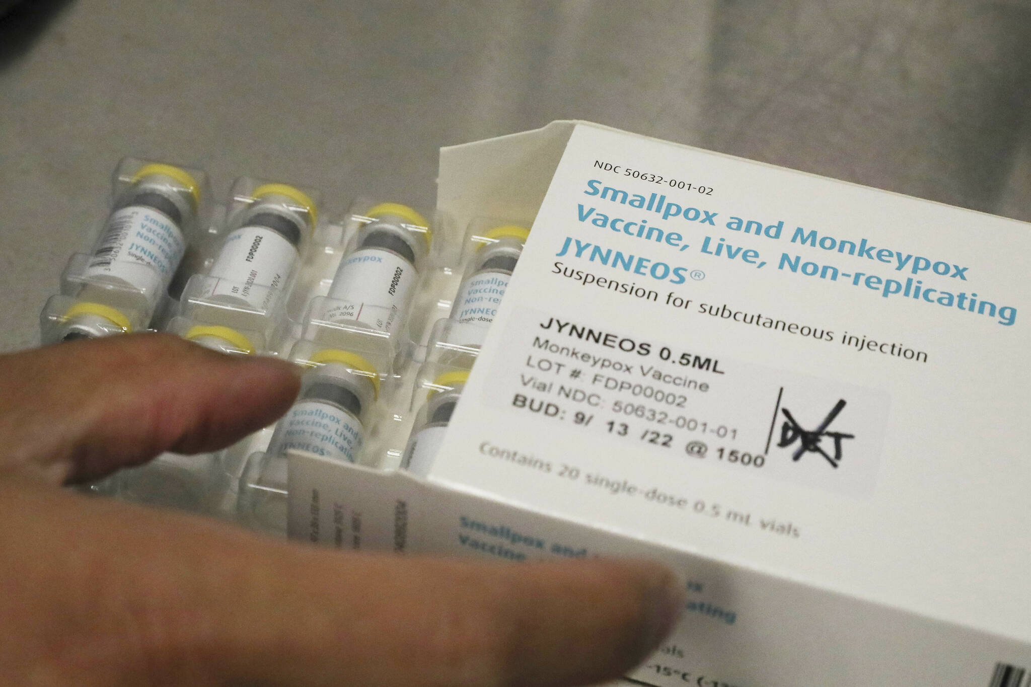 Vials of of the Jynneos vaccine for monkeypox are removed from a box containing 20 doses, in the vaccine hub at Zuckerberg San Francisco General Hospital on Friday, July 29, 2022, in San Francisco. (Lea Suzuki/San Francisco Chronicle via AP)