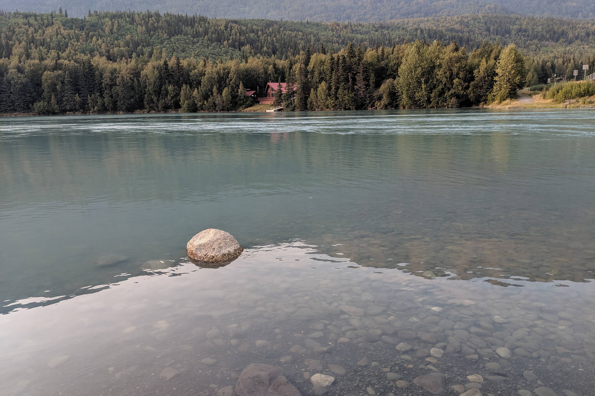 The Kenai River flows into Kenai Lake, in Cooper Landing, Alaska, Aug. 9, 2019. (Photo by Erin Thompson/Peninsula Clarion file)