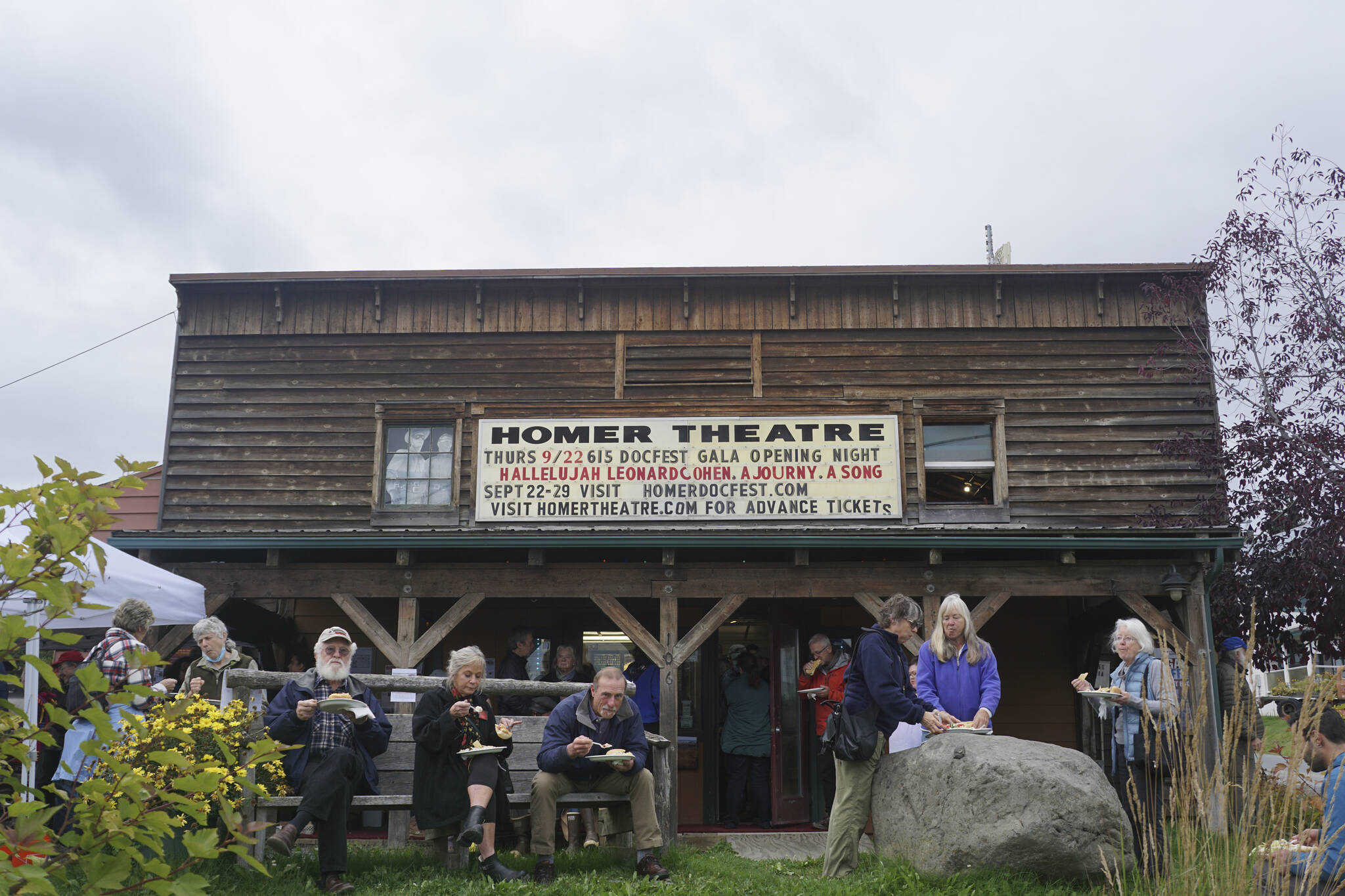 Film fans enjoy reindeer sausages and hot dogs at the gala opening of the Homer Documentary Film Festival last Thursday, Sept. 22 at the Homer Theatre. (Photo by Michael Armstrong/Homer News)