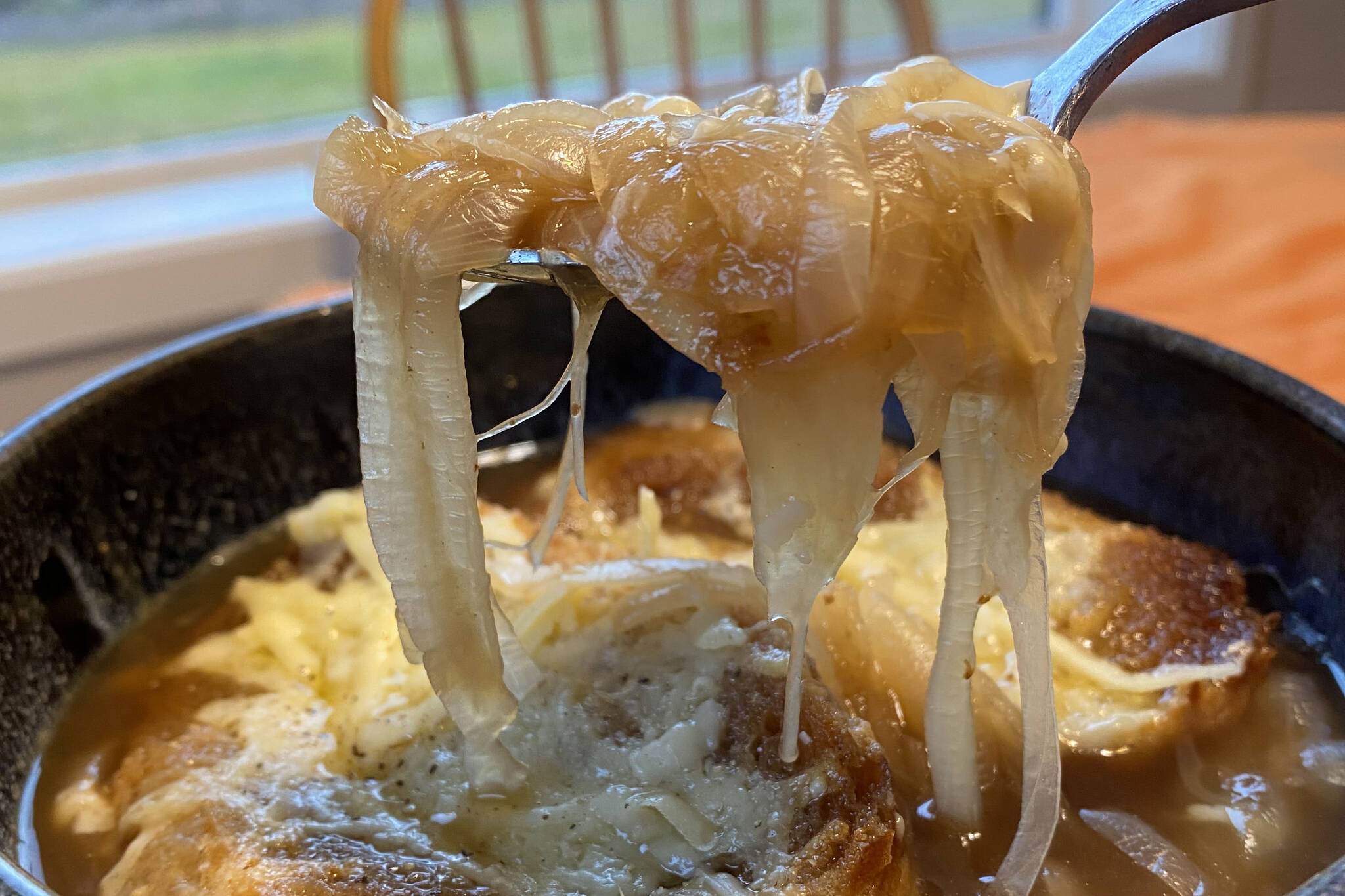 Onions are sauteed, doused in broth and then topped off with cheese and bread in this recipe for French Onion Soup. (Photo by Tressa Dale/Peninsula Clarion)