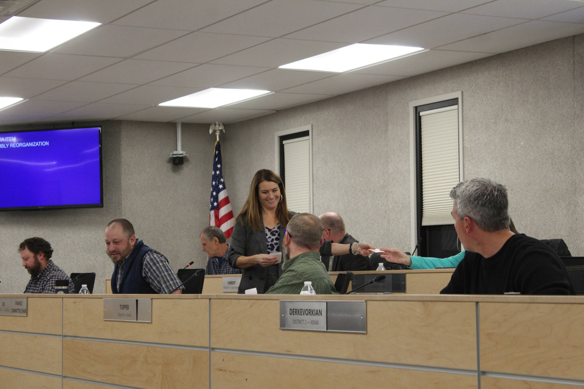 Kenai Peninsula Borough Clerk Johni Blankenship collects ballots from assembly members during a meeting on Tuesday, Oct. 25, 2022 in Soldotna, Alaska. (Ashlyn O'Hara/Peninsula Clarion)