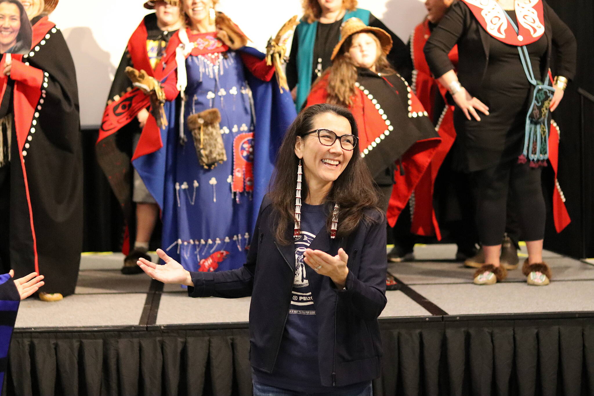 U.S. Rep. Mary Peltola dances with others attending a reelection campaign event Monday evening at Elizabeth Peratrovich Hall. Peltola also attended a meet-and-greet at a coffee shop and met with local union members on Tuesday. (Mark Sabbatini / Juneau Empire)