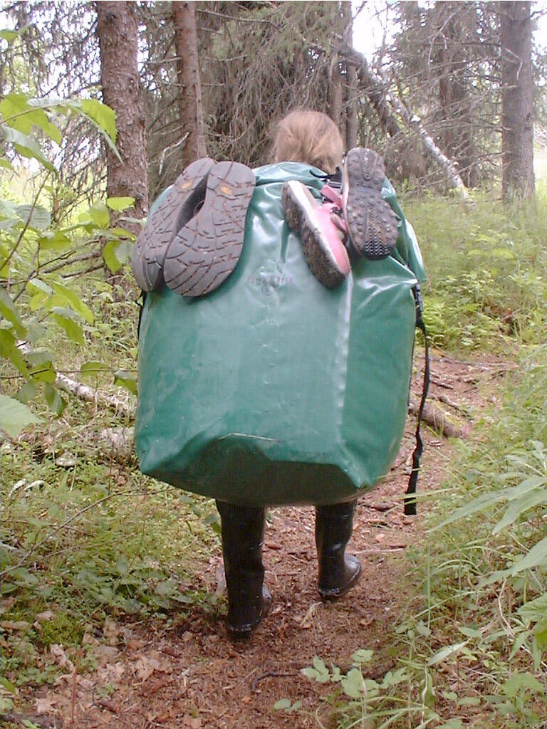 Sometimes the dry bags are a large as those carrying it. (Photo by Matt Bowser)