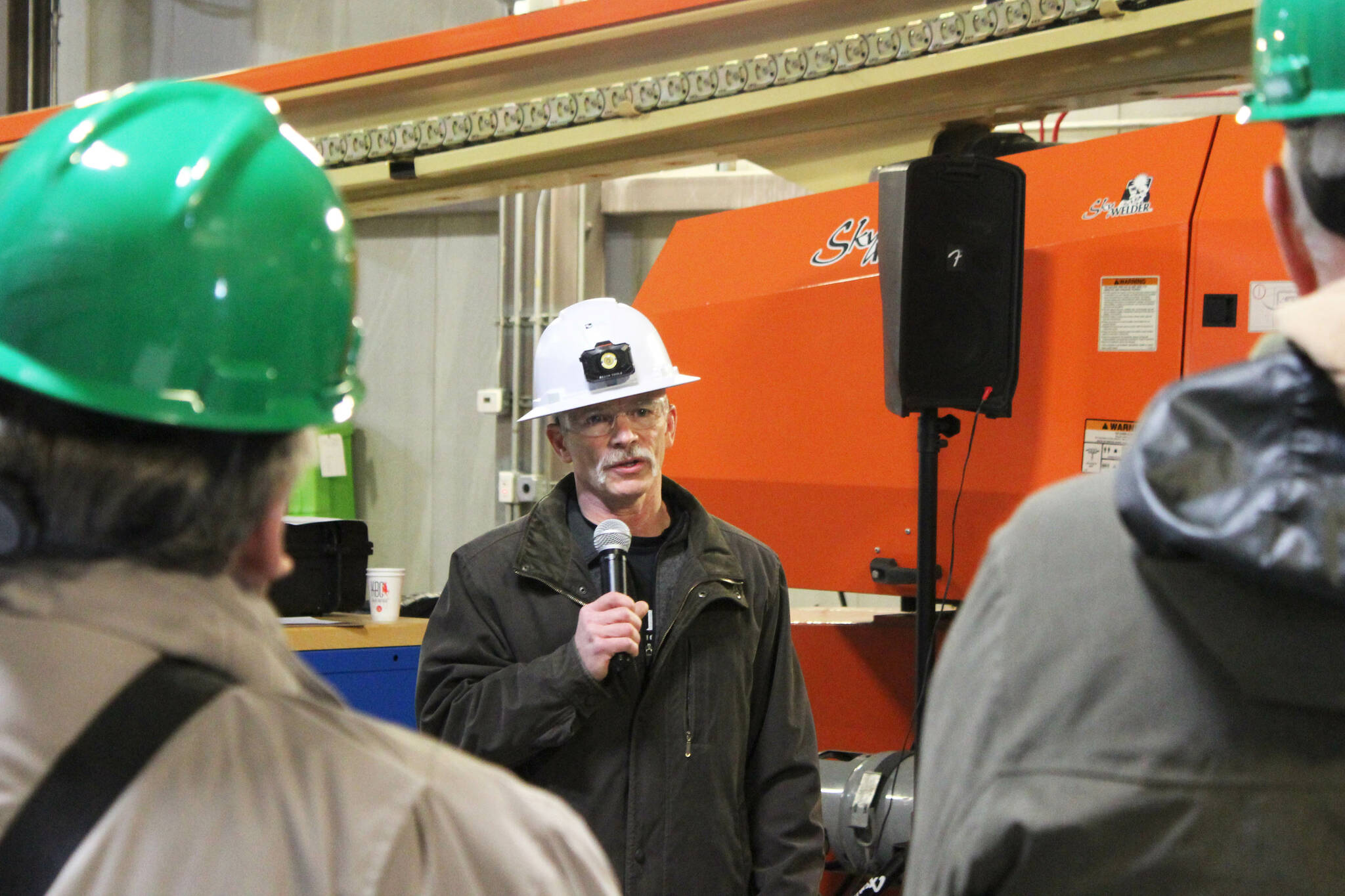 Homer Electric Association General Manager Brad Janorschke addresses attendees at a ceremony celebrating HEA’s Tesla battery energy storage system on Tuesday, Nov. 1, 2022, near Soldotna, Alaska. (Ashlyn O’Hara/Peninsula Clarion)