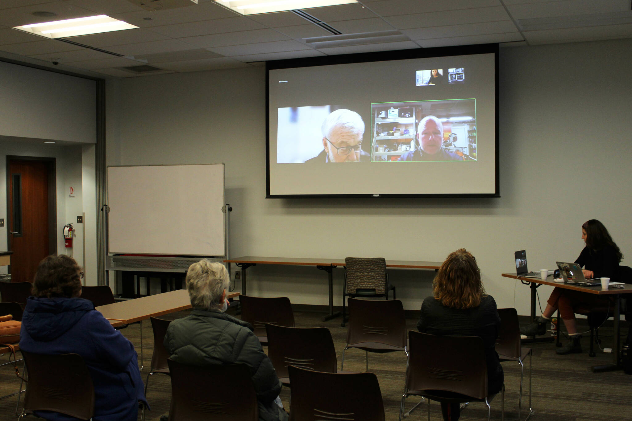 Candidates for Alaska State Senate District C Gary Stevens, on screen, left, and Heath Smith, on screen, right, participate remotely in a forum held at the Soldotna Public Library on Monday, Oct. 24, 2022 in Soldotna, Alaska. (Ashlyn O’Hara/Peninsula Clarion)