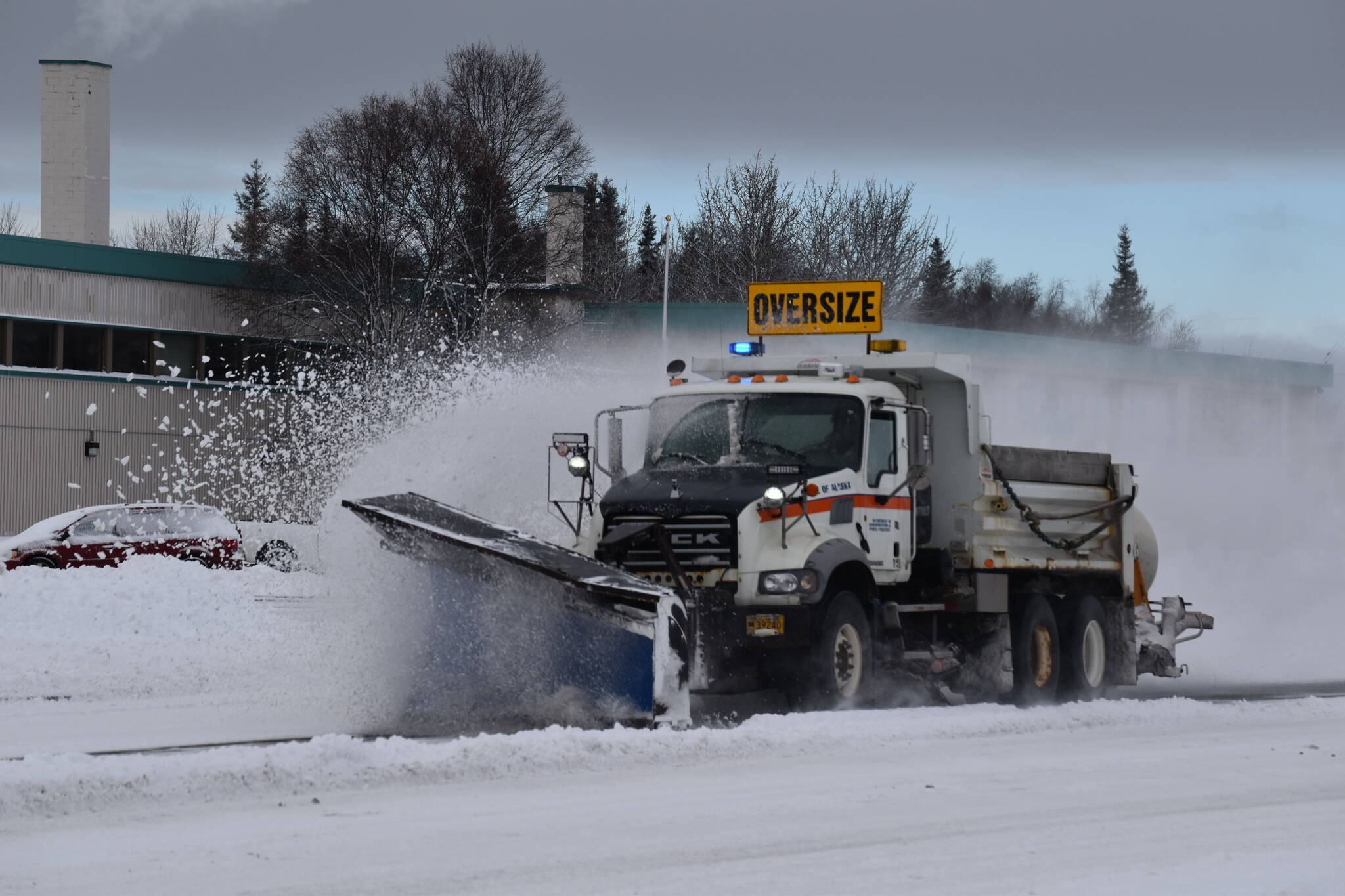 A plow truck clears snow as it moves down the Kenai Spur Highway in Kenai, Alaska on Wednesday, Oct. 26, 2022. (Jake Dye/Peninsula Clarion)
A plow truck clears snow as it moves down the Kenai Spur Highway in Kenai, Alaska on Wednesday, Oct. 26, 2022. (Jake Dye/Peninsula Clarion)