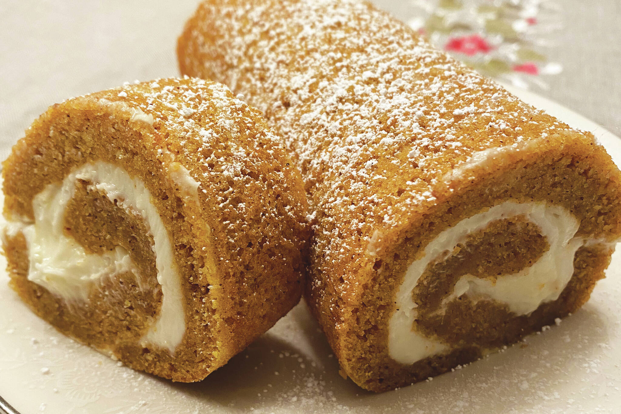 A pumpkin spice roll with cream cheese filling is photographed on Oct. 31, 2022, in Nikiski, Alaska. (Photo by Tressa Dale/Peninsula Clarion)