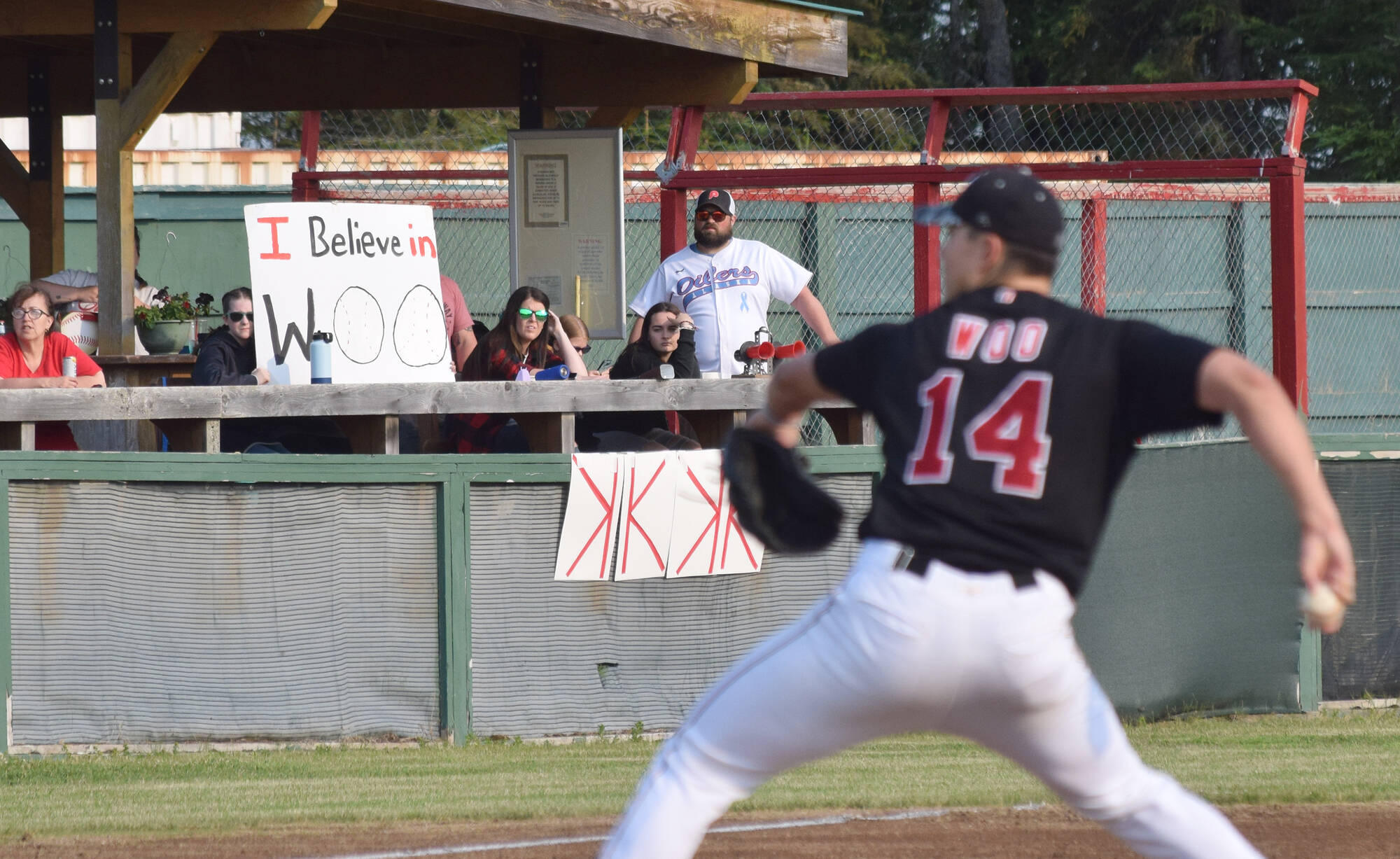 Peninsula Oilers fans display encouragin signs for Oilers’ pitcher Bryan Woo, Friday, June 28, 2019, at Coral Seymour Memorial Park in Kenai. (Photo by Joey Klecka/Peninsula Clarion)