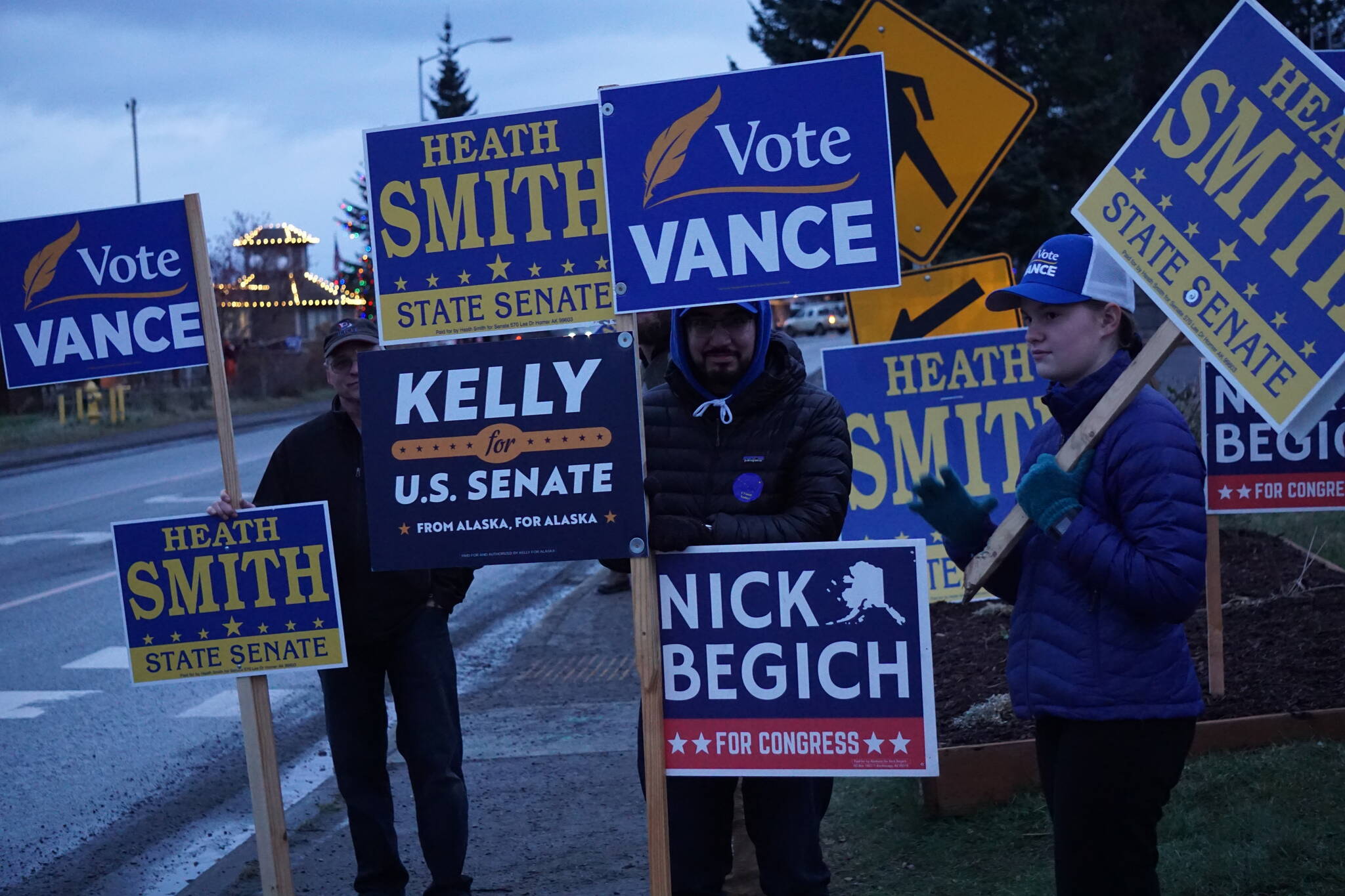 Republican Party supporters wave signs on Tuesday, Nov. 8. 2022, on Pioneer Avenue in Homer, Alaska, in support of Republican Party candidates Rep. Sarah Vance, R-Homer, Heath Smith, running for State Senate District C, Kelly Tshibaka, running for U.S. Senate, and Nick Begich III, running for U.S. Congress. (Photo by Michael Armstrong/Homer News)