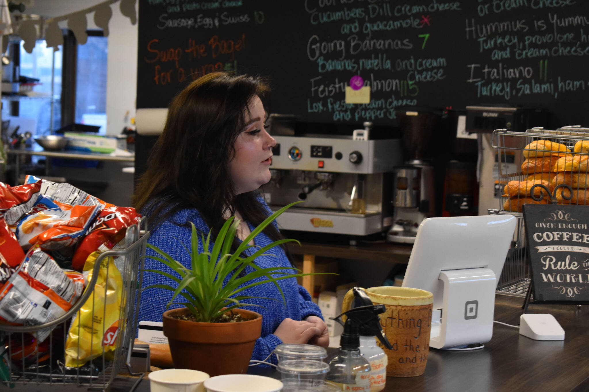 Abbi Suprick speaks to a member of her staff at Everything Bagels in Soldotna, Alaska, on Thursday, Nov. 17, 2022. (Jake Dye/Peninsula Clarion)