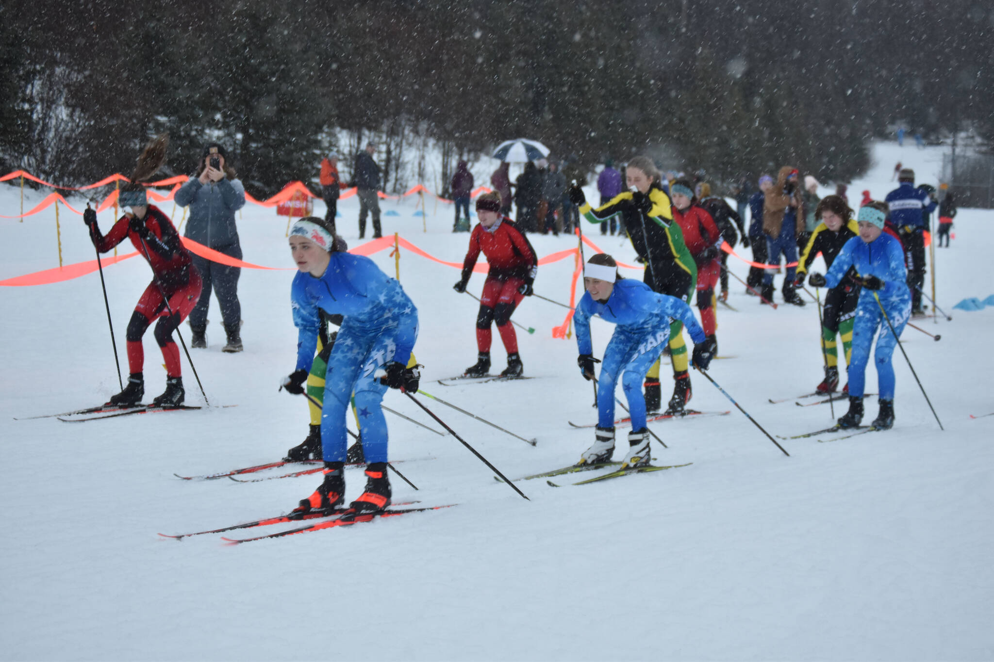 Skiers from Kenai, Seward and Soldotna start the girls race during the Turkey Trot on Tuesday, Nov. 22, 2022, at Tsalteshi Trails in Soldotna, Alaska.