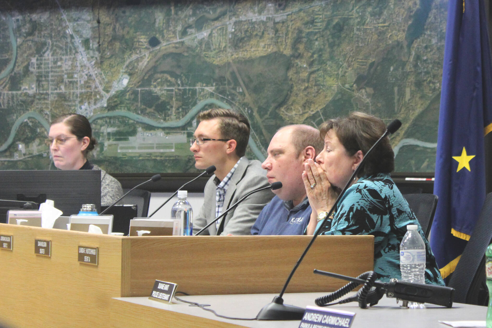 From right, Soldotna City Council members Linda Farnsworth-Hutchings, Dan Nelson and Jordan Chilson listen to testimony during a council meeting on Wednesday, July 13, 2022, in Soldotna, Alaska. (Ashlyn O’Hara/Peninsula Clarion)