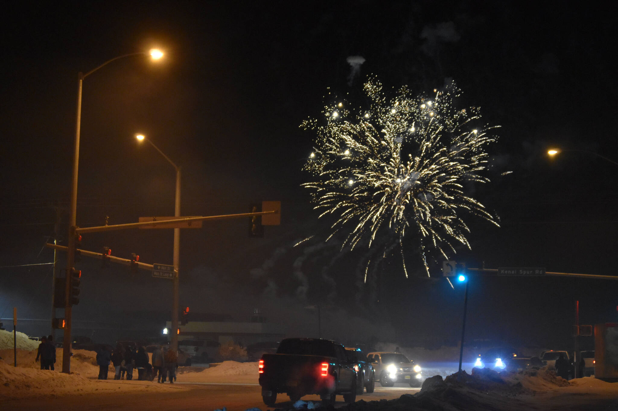 Fireworks explode over the City of Kenai during Christmas Comes to Kenai festivities at the Kenai Chamber of Commerce and Visitor Center in Kenai, Alaska, on Friday, Nov. 25, 2022. (Jake Dye/Peninsula Clarion)