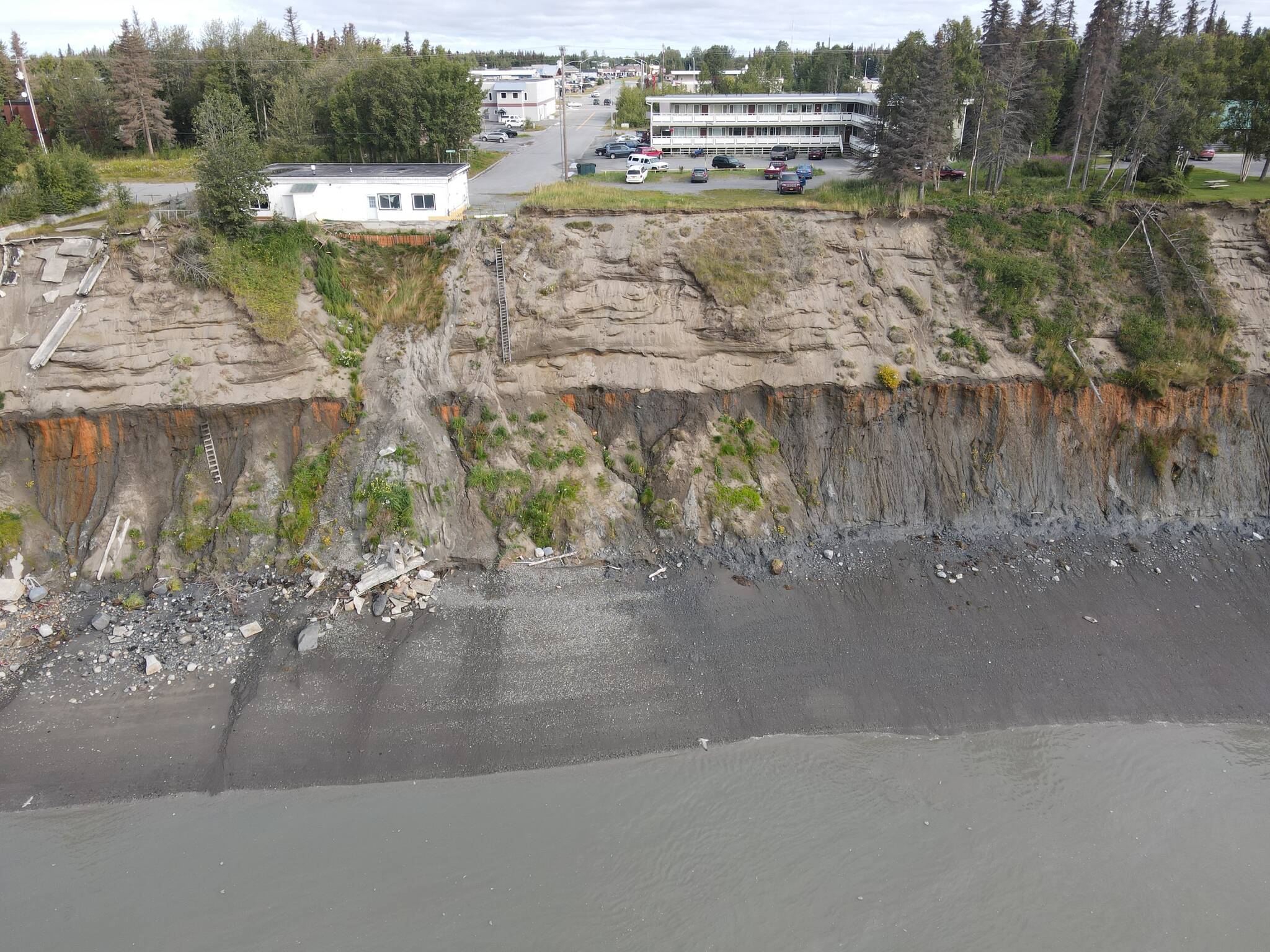 Portions of the Kenai bluff can be seen eroding below Old Town Kenai in this undated photo. (Photo by Aidan Curtin/courtesy Scott Curtin)