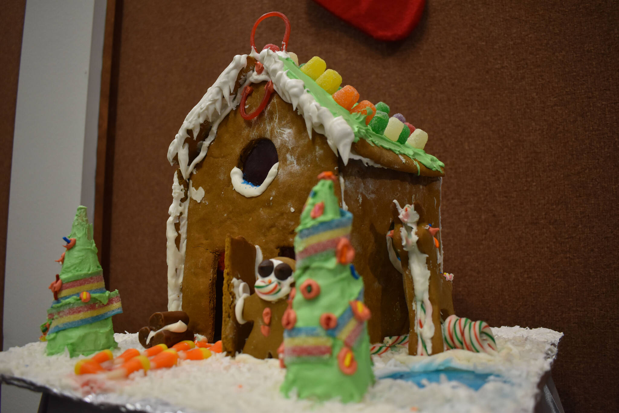 A gingerbread house designed by Evelyn is displayed at the Kenai Chamber of Commerce and Visitor Center on Tuesday, Dec. 6, 2022. (Jake Dye/Peninsula Clarion)
