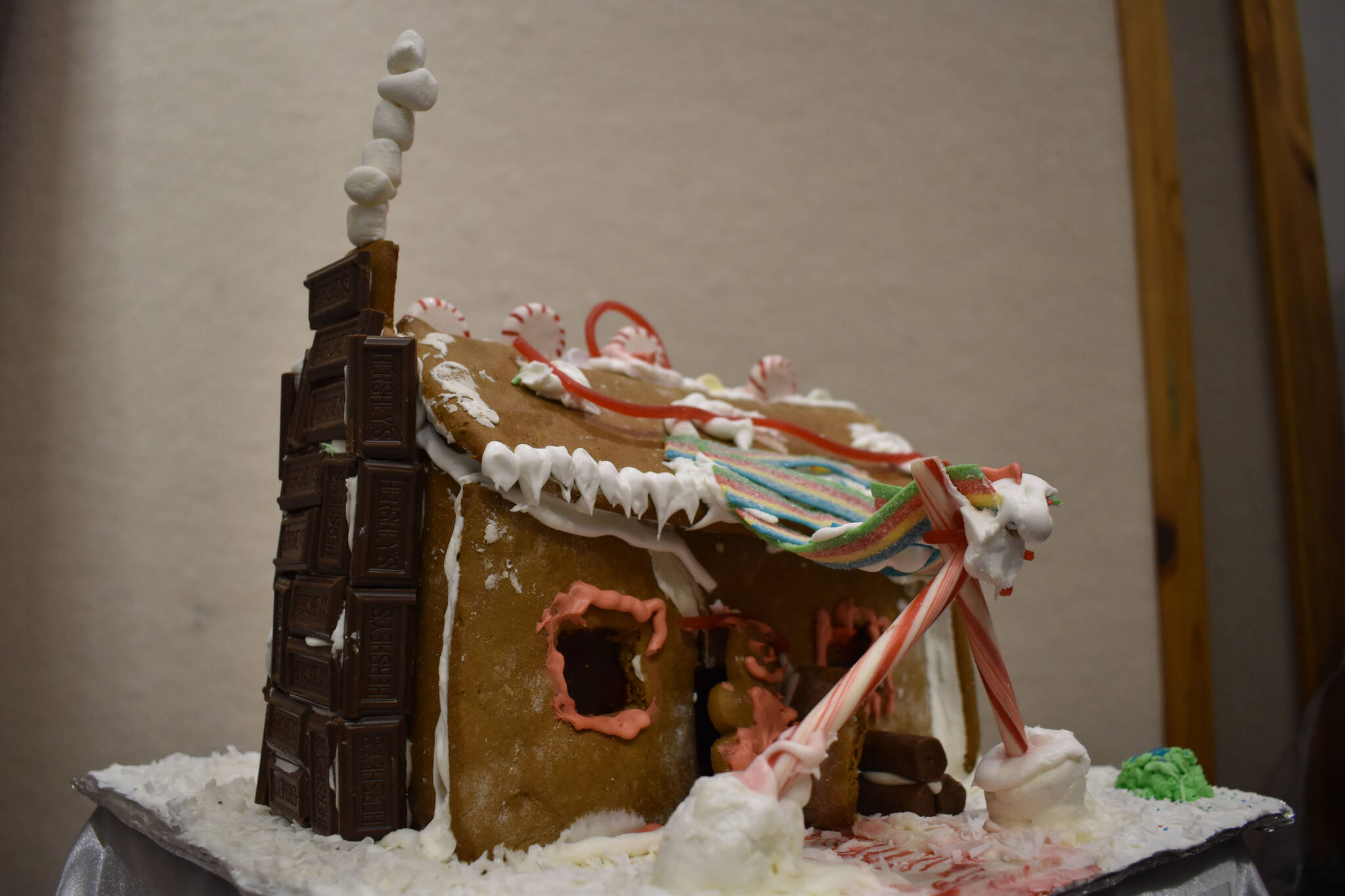 A gingerbread house designed by Charis is displayed at the Kenai Chamber of Commerce and Visitor Center on Tuesday, Dec. 6, 2022. (Jake Dye/Peninsula Clarion)