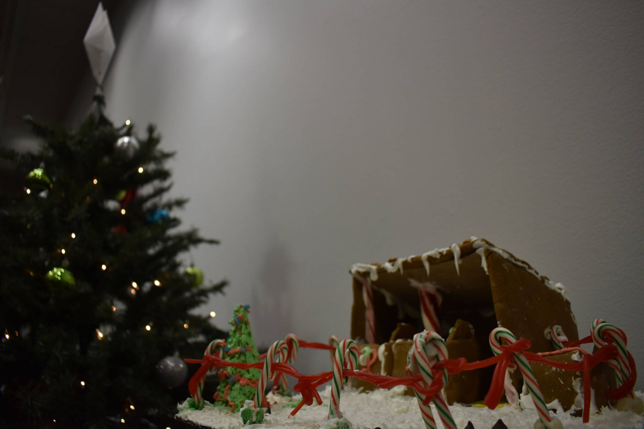 A gingerbread house designed by Josephine is displayed at the Kenai Chamber of Commerce and Visitor Center on Tuesday, Dec. 6, 2022. (Jake Dye/Peninsula Clarion)