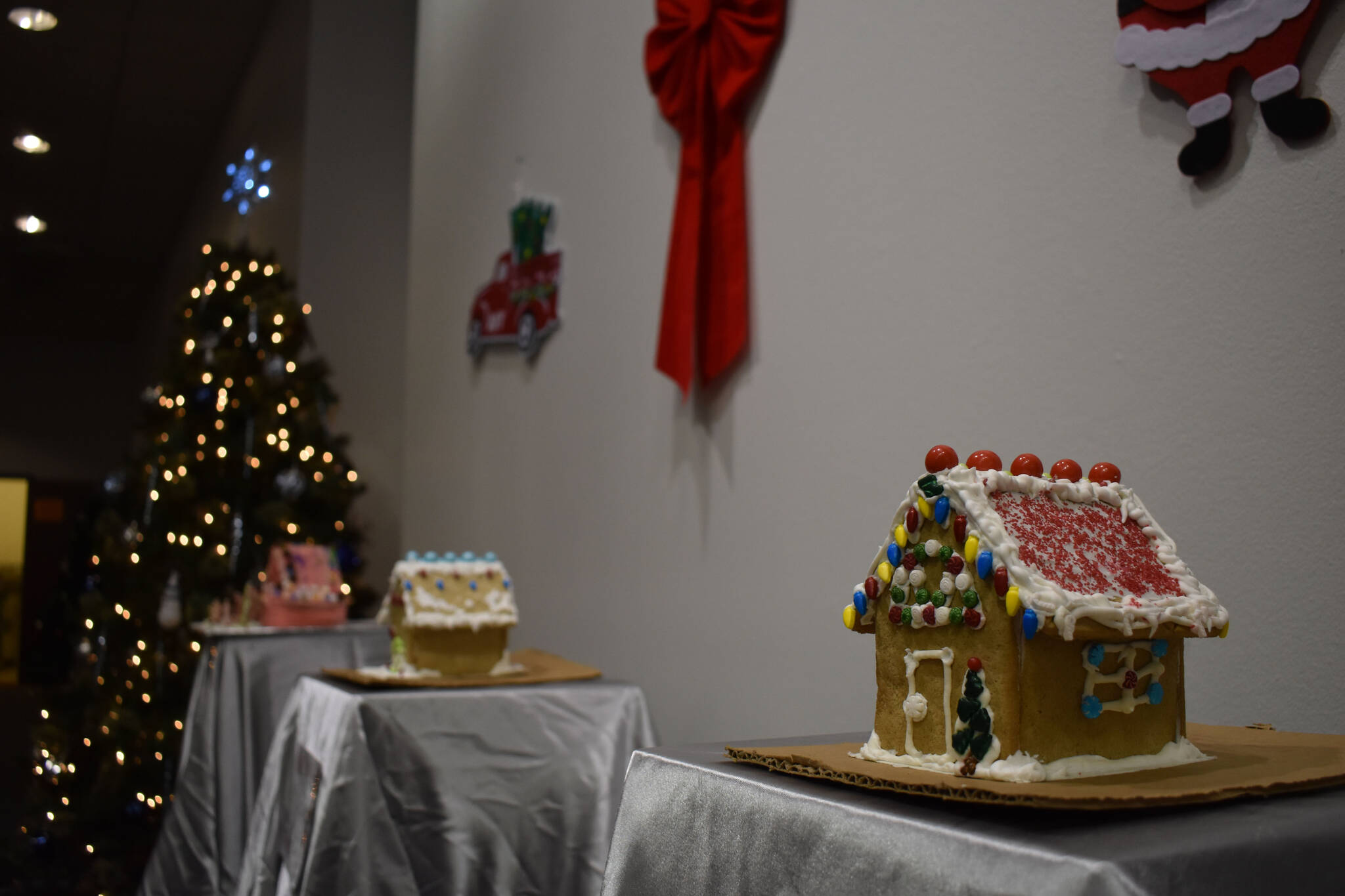 Gingerbread houses are displayed at the Kenai Chamber of Commerce and Visitor Center on Tuesday, Dec. 6, 2022. (Jake Dye/Peninsula Clarion)