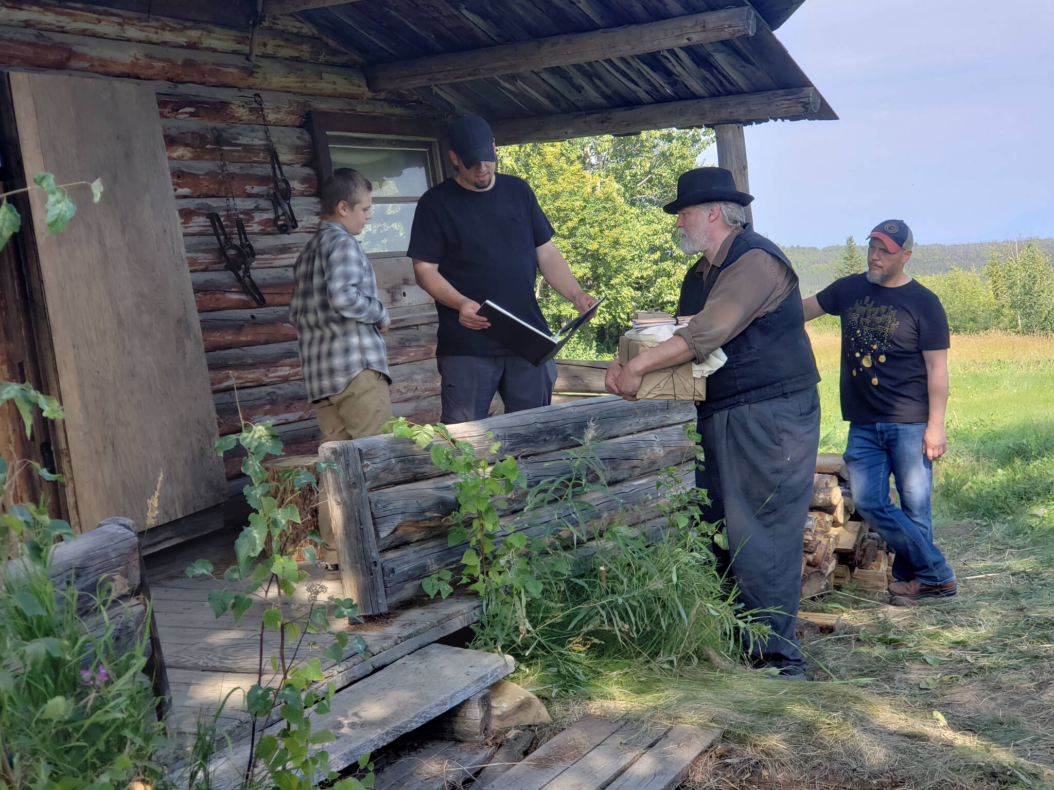 Eric Downs speaks to actors Iver Mitchell and Steven B. Hill during filming of “A Dreamer’s Search” in this undated photo. (Photo courtesy Eric Downs/Downstream Films)