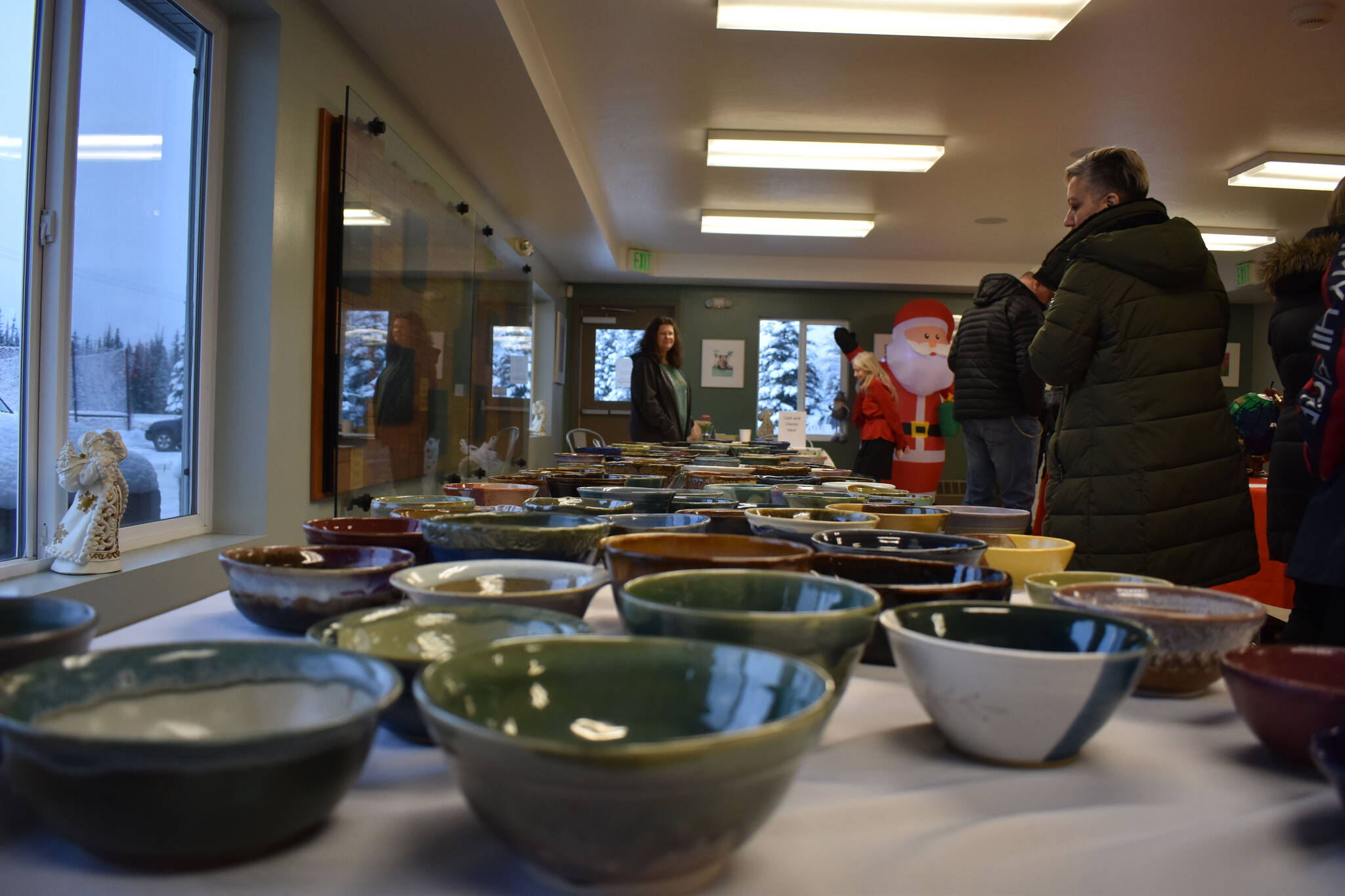 Countless ceramic soup bowls are seen, awaiting buyers during Bark, Block and Bowl on Saturday, Dec. 10, 2022, at the Kenai Peninsula Food Bank in Soldotna, Alaska. (Jake Dye/Peninsula Clarion)