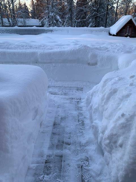 Several feet of snow are cleared in the Sports Lake area on Monday, Dec. 12, 2022, in Soldotna, Alaska. (Photo courtesy Michele Vasquez)