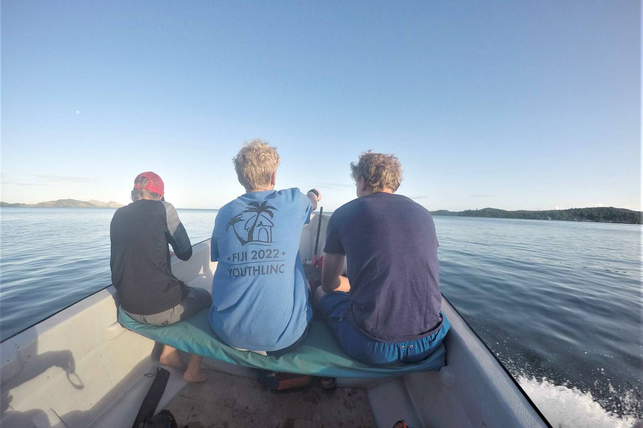 Riding out to explore a barrier reef. (Photo by Mark Laker/USFWS)