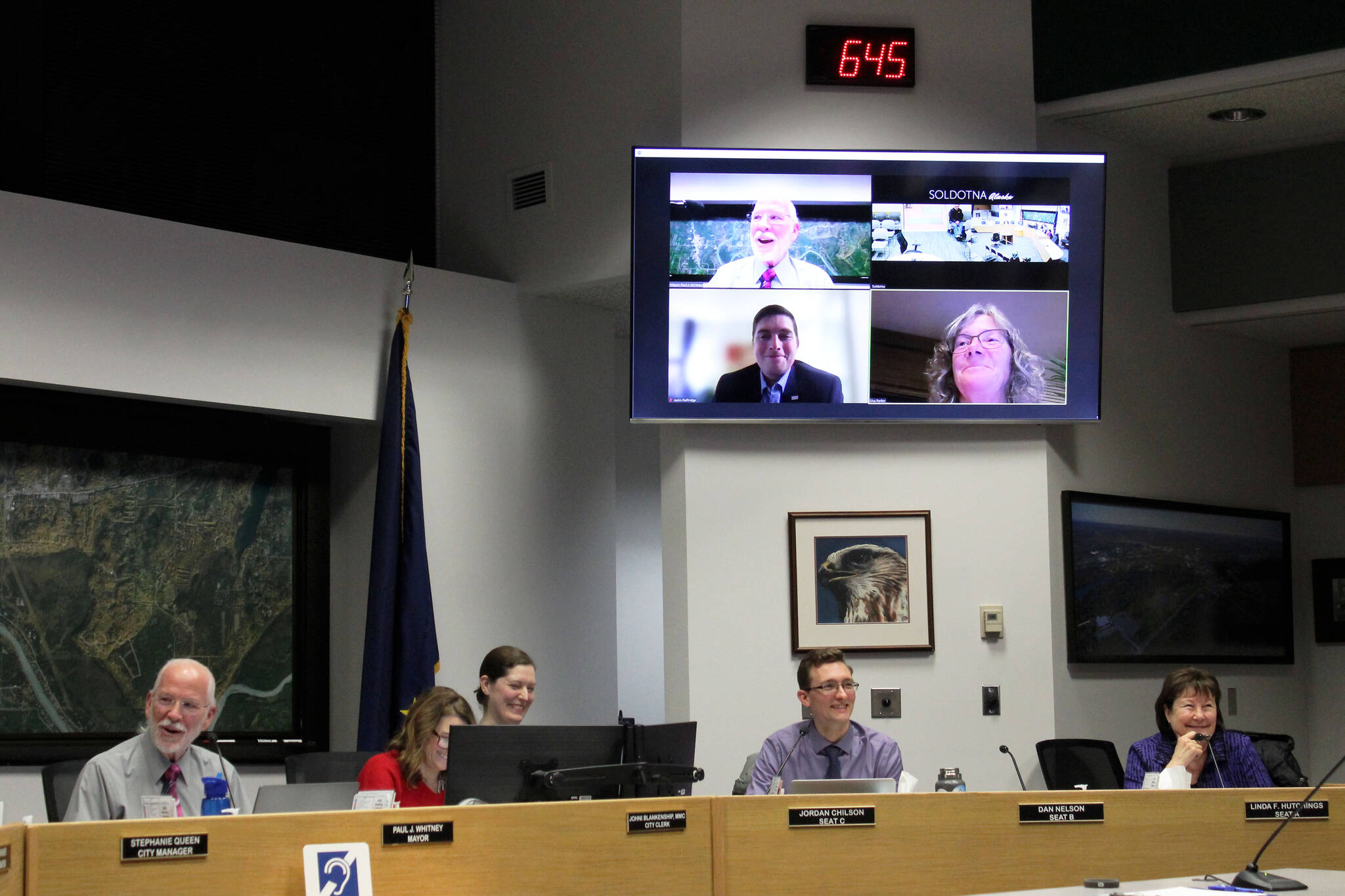 Soldotna City Council members thank outgoing council member Justin Ruffridge for his years of service to the city during a council meeting on Wednesday, Dec. 14, 2022, in Soldotna, Alaska. Ruffridge was elected last month to the Alaska Legislature. (Ashlyn O’Hara/Peninsula Clarion)