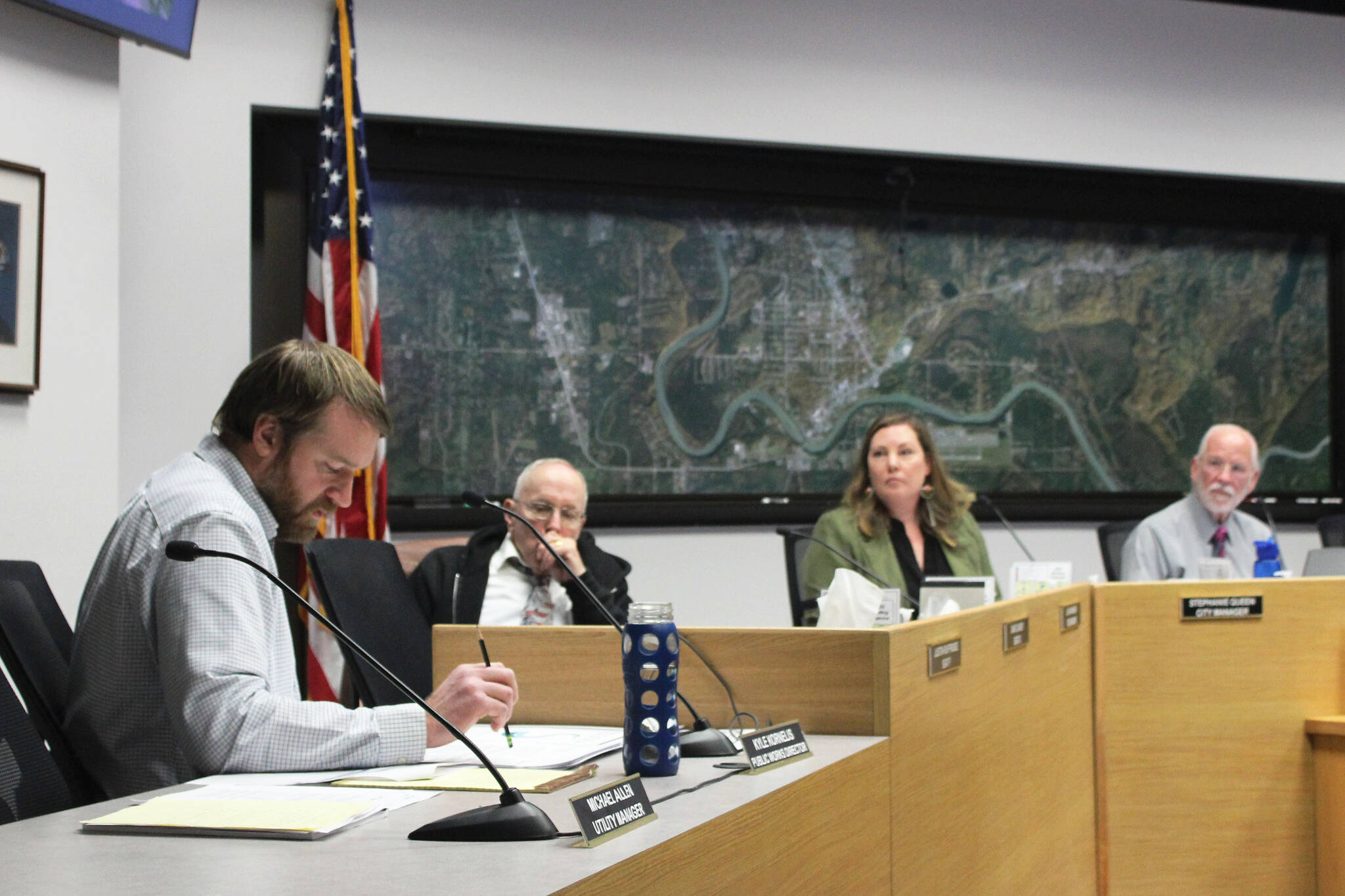 Soldotna Public Works Director Kyle Kornelis, left, talks about the Soldotna field house project during a Soldotna City Council meeting on Wednesday, Dec. 14, 2022 in Soldotna, Alaska. (Ashlyn O’Hara/Peninsula Clarion)
