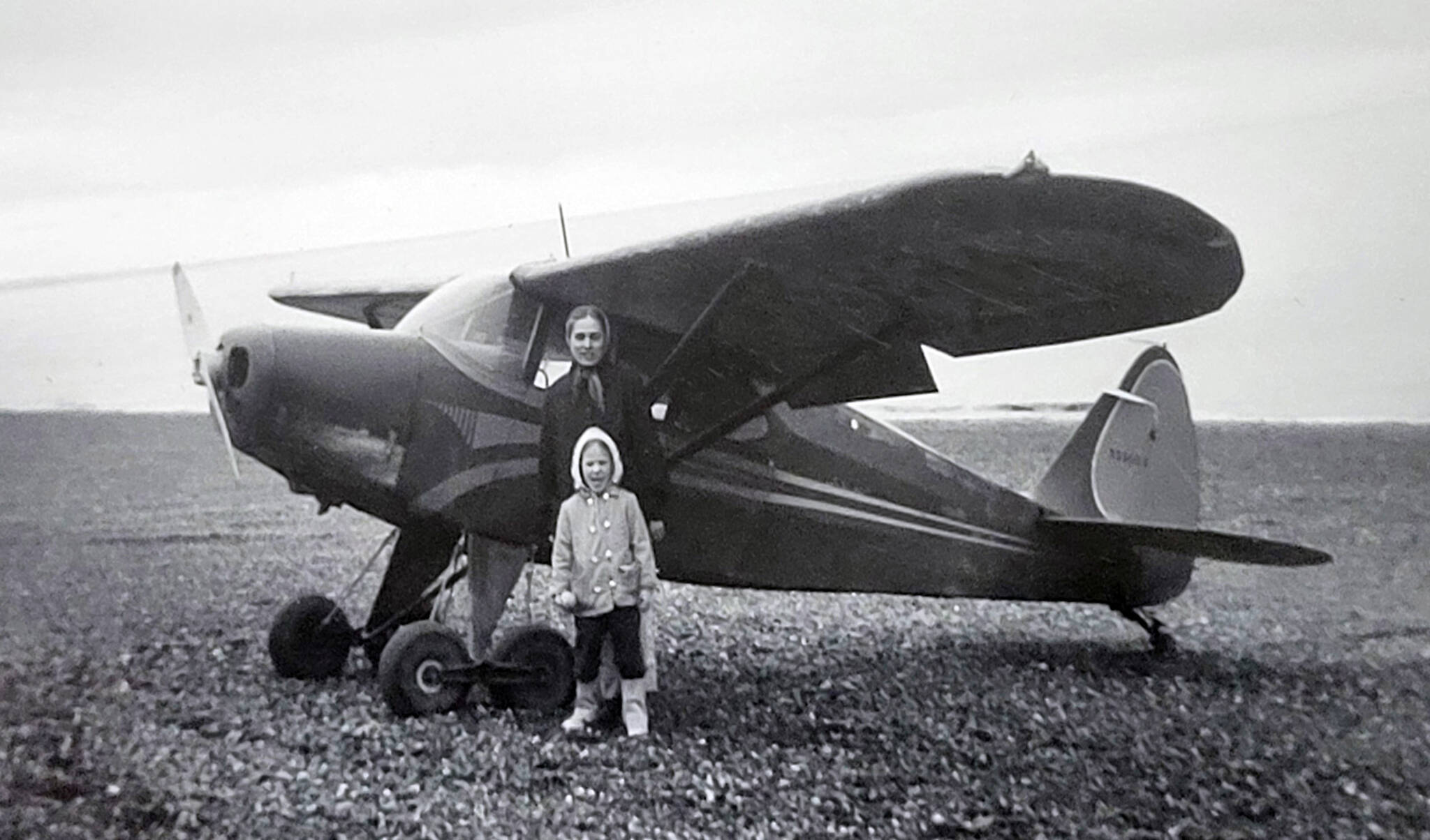 Marian and Grace Goble pose near Ben Goble’s airplane near Kenai, circa 1959-60. (Photo courtesy of Ben and Marian Goble)