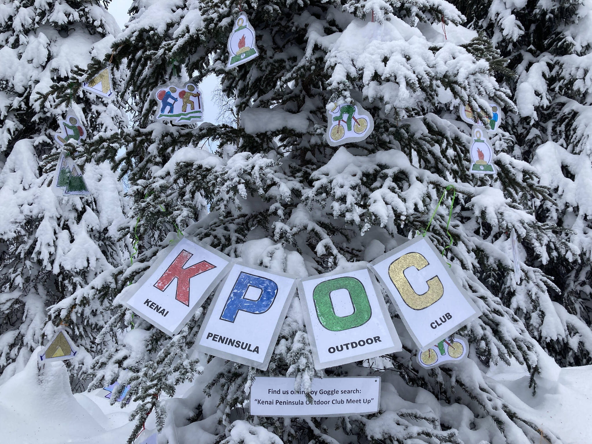 A tree decorated by the Kenai Peninsula Outdoor Club is seen on the Moose Loop at Tsalteshi Trails on Thursday, Dec. 22, 2022, near Soldotna, Alaska. (Photo by Jeff Helminiak/Peninsula Clarion)