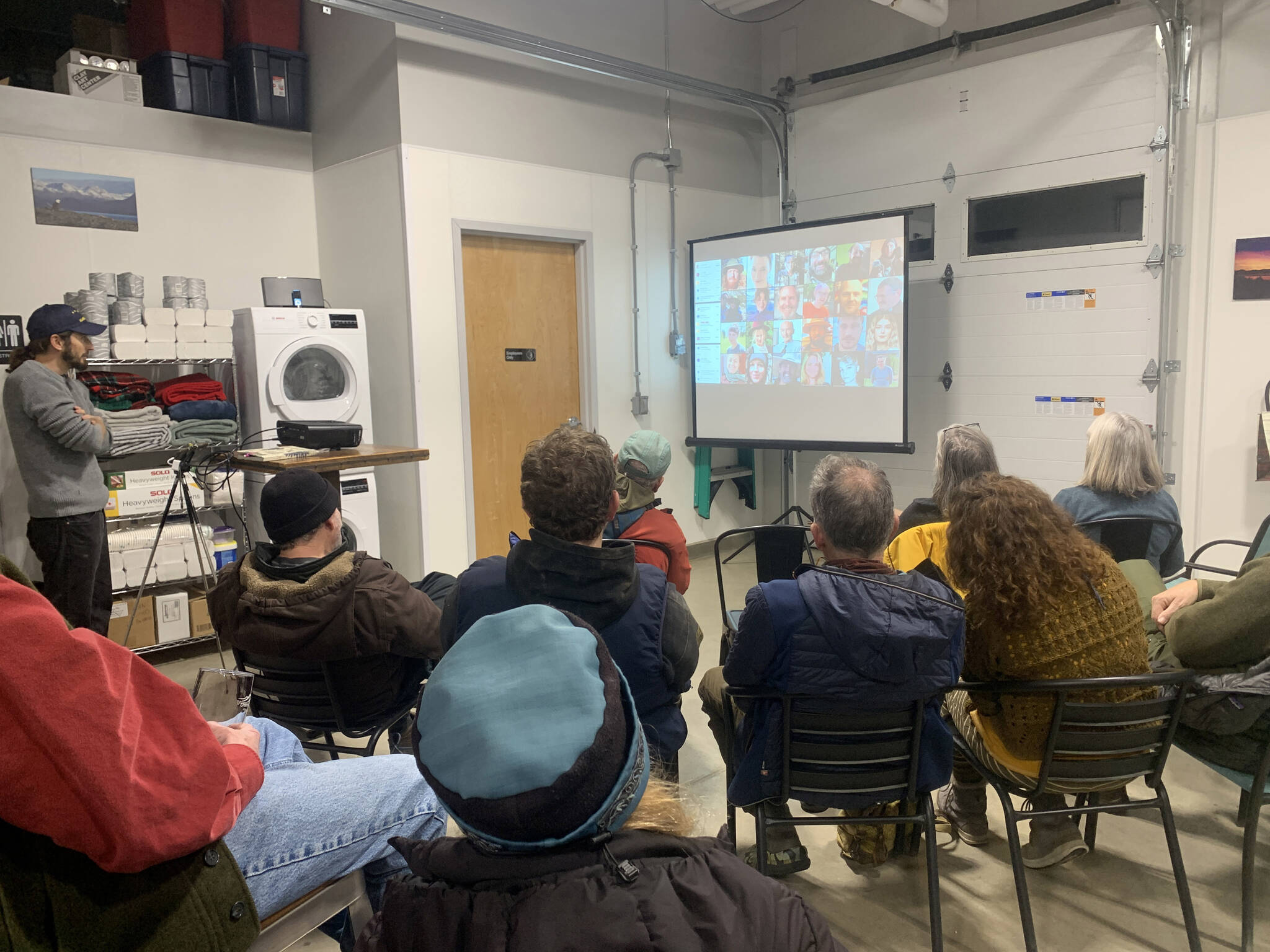 Community members gather at Grace Ridge Brewing for a presentation by Lucas Wilcox about his humanitarian efforts in Ukraine and other places, On December 8, 2022, in Homer, Alaska. (Photo by Christina Whiting/Homer News)