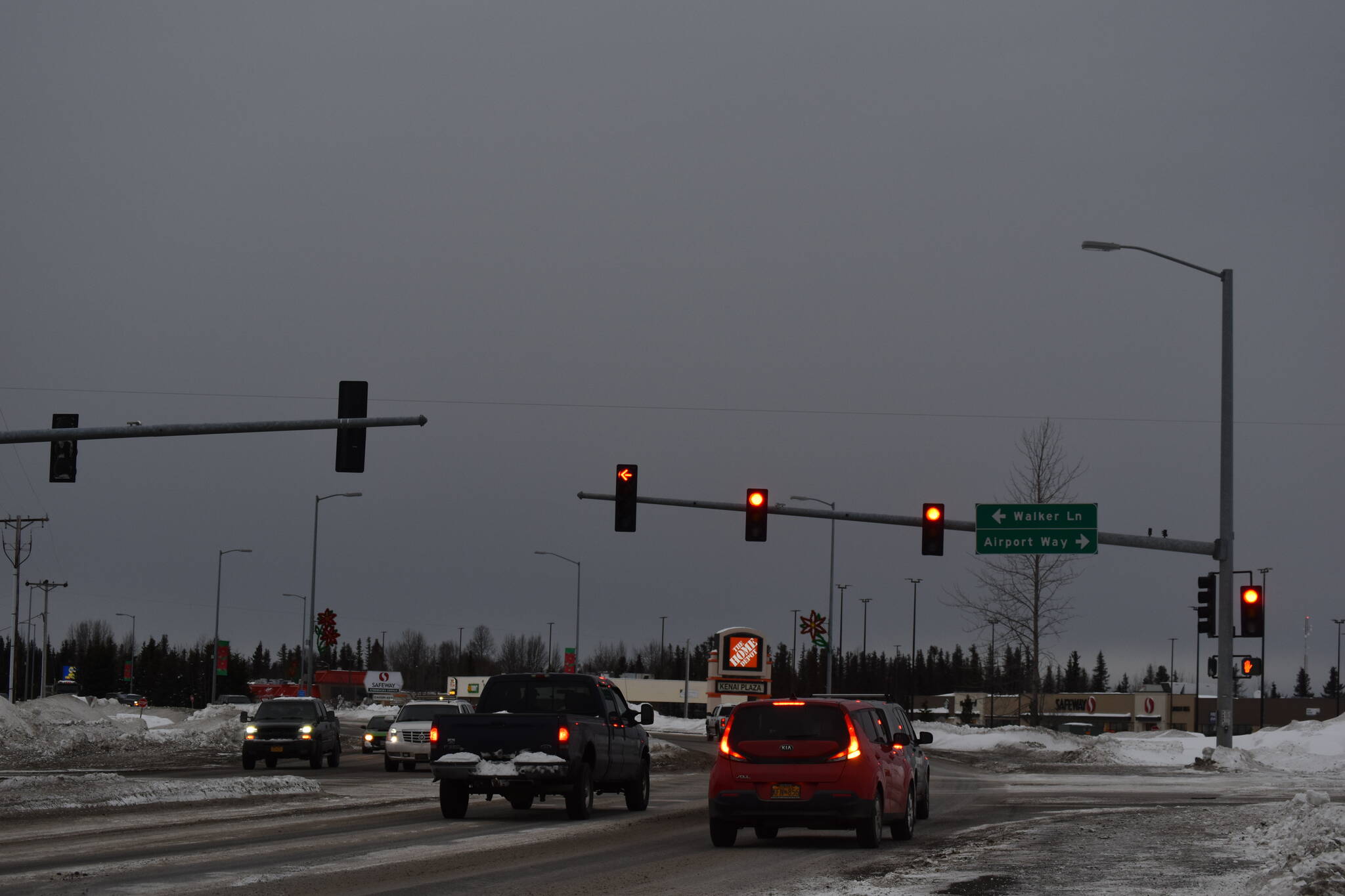 Dark clouds hang over Kenai, Alaska, on Monday, Dec. 26, 2022, seen from the parking lot of the Quality Inn in Kenai, Alaska. (Jake Dye/Peninsula Clarion)