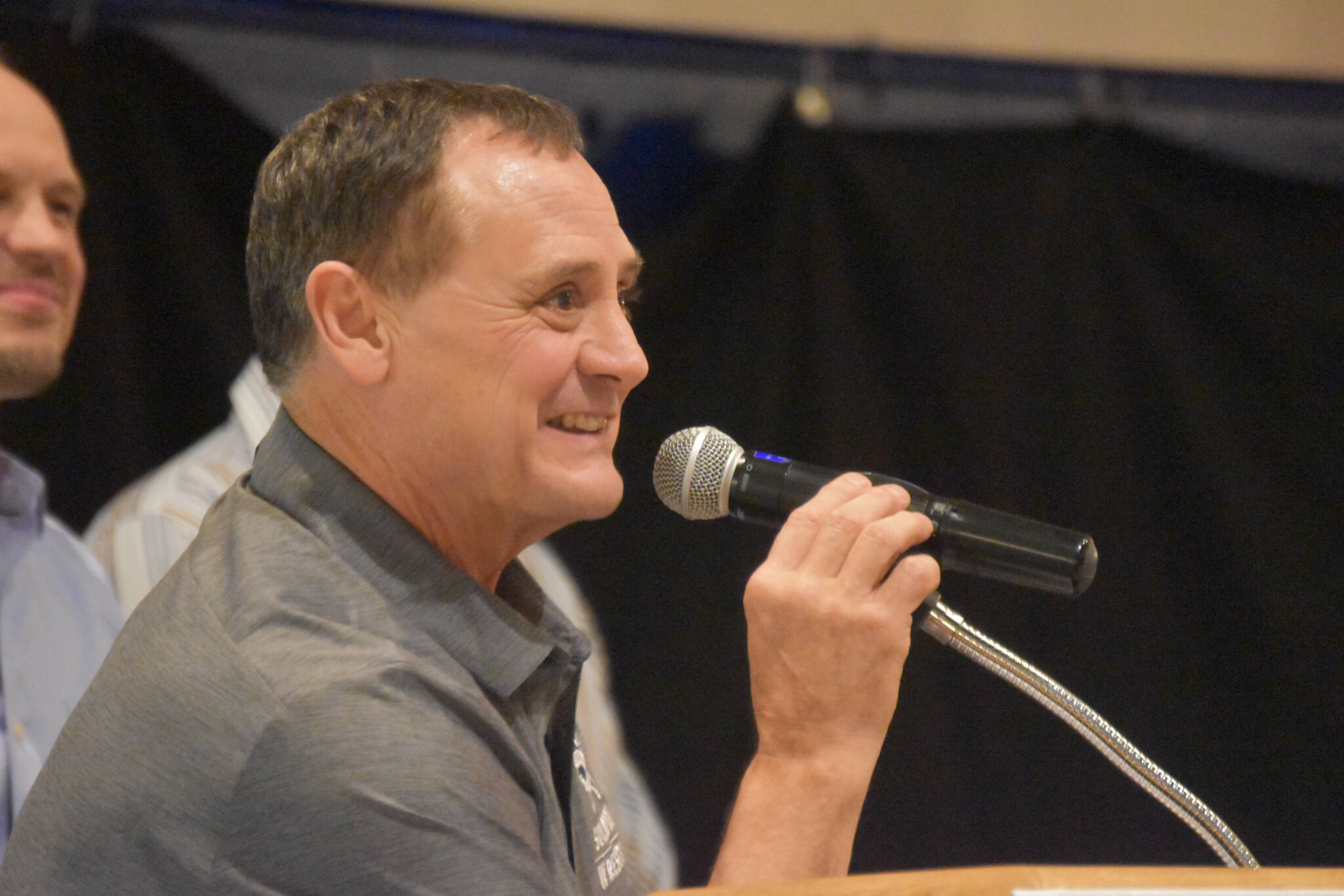 Neldon Gardner speaks while being inducted to the National Wrestling Hall of Fame following the duel wrestling meet on Tuesday, Nov. 22, 2022, at Soldotna High School in Soldotna, Alaska. (Jake Dye/Peninsula Clarion)