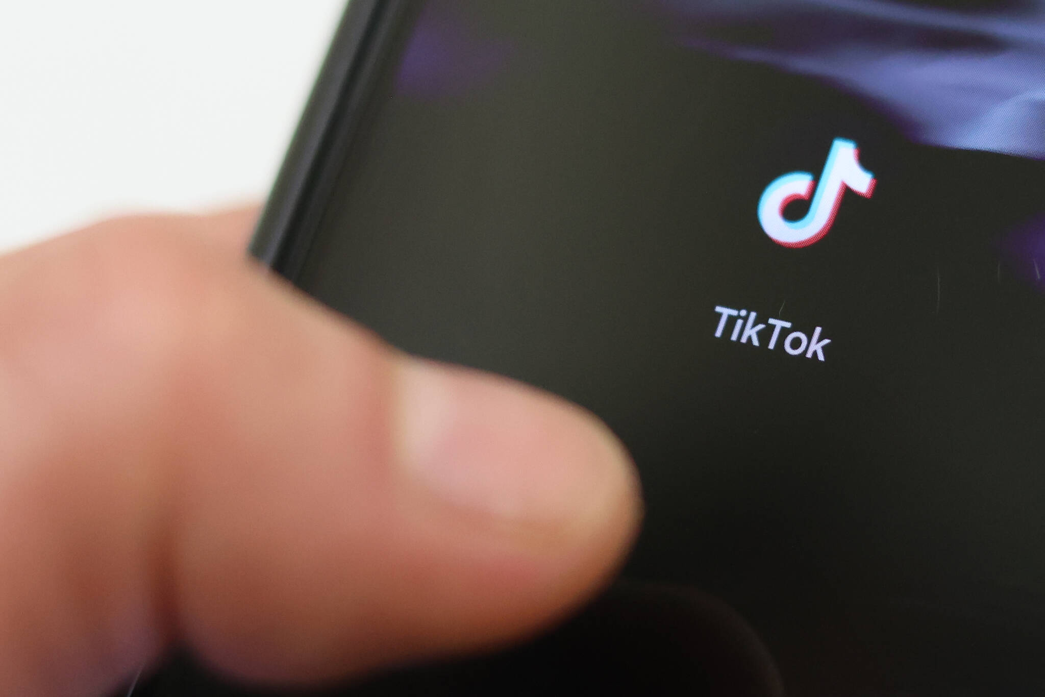 This photo shows the TikTok icon on a phone screen. (Ben Hohenstatt / Juneau Empire)