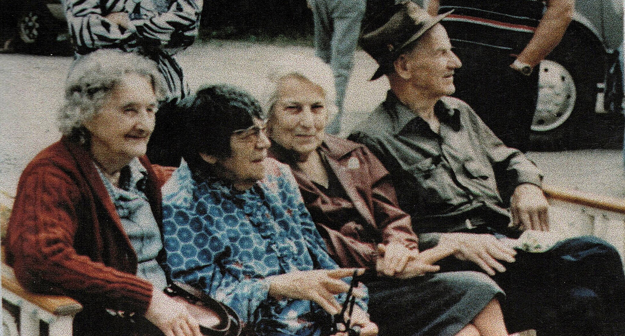 Photo 210.029.161, from the Clark Collection, courtesy of Hope and Sunrise Historical and Mining Museum 
In the seats of honor at the 1988 Hope Centennial Parade are (L-R) Helen DeFrance, Annie Hatch, and Emma and Carl Clark.