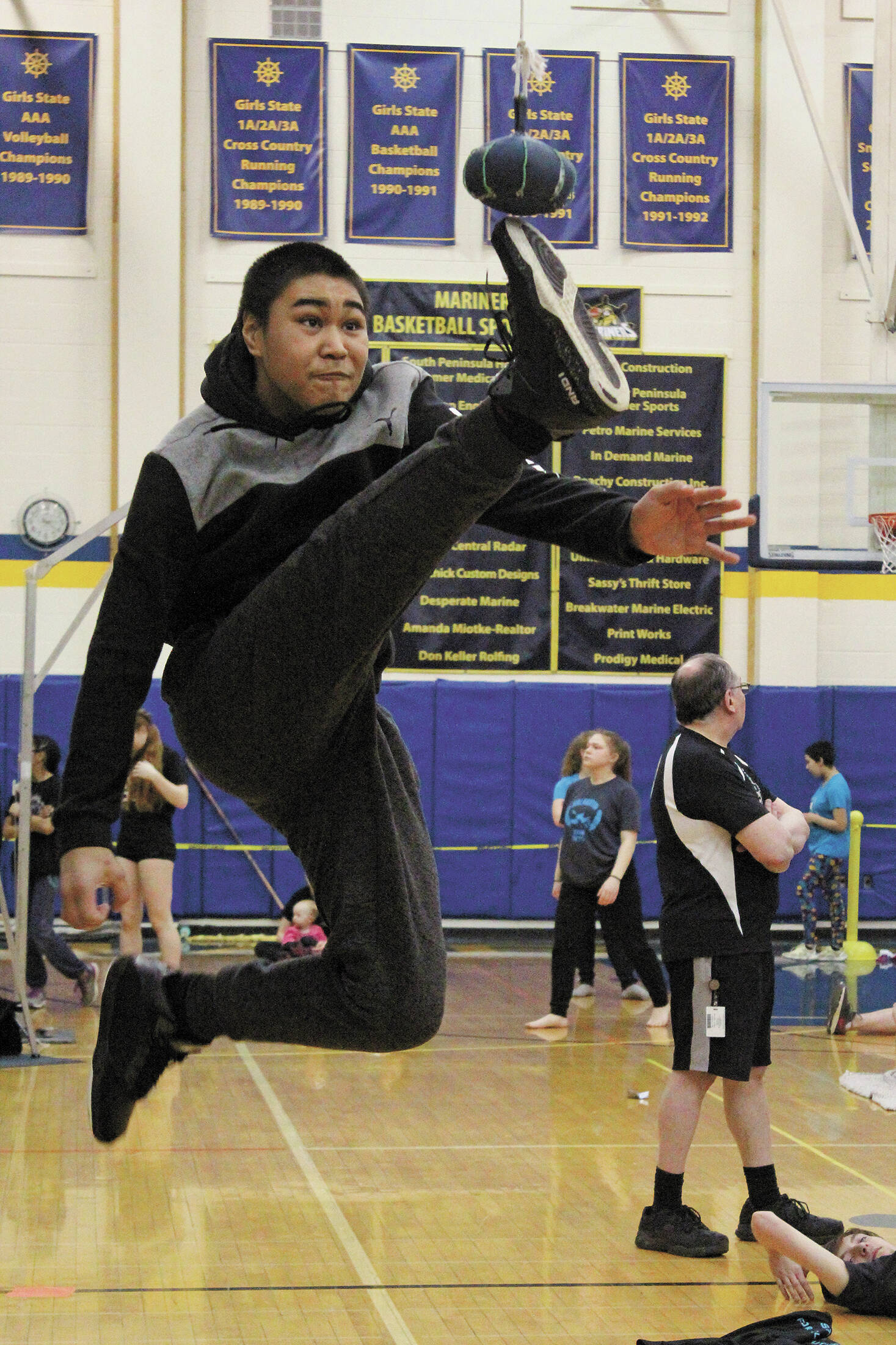 Megan Pacer / Homer News file
James Mishakoff of Tebughna School in Tyonek just misses connecting with the ball during the 1-foot high kick event at the Kachemak Bay Traditional Games, a Native Youth Olympics invite, March 7, 2020, at Homer High School.