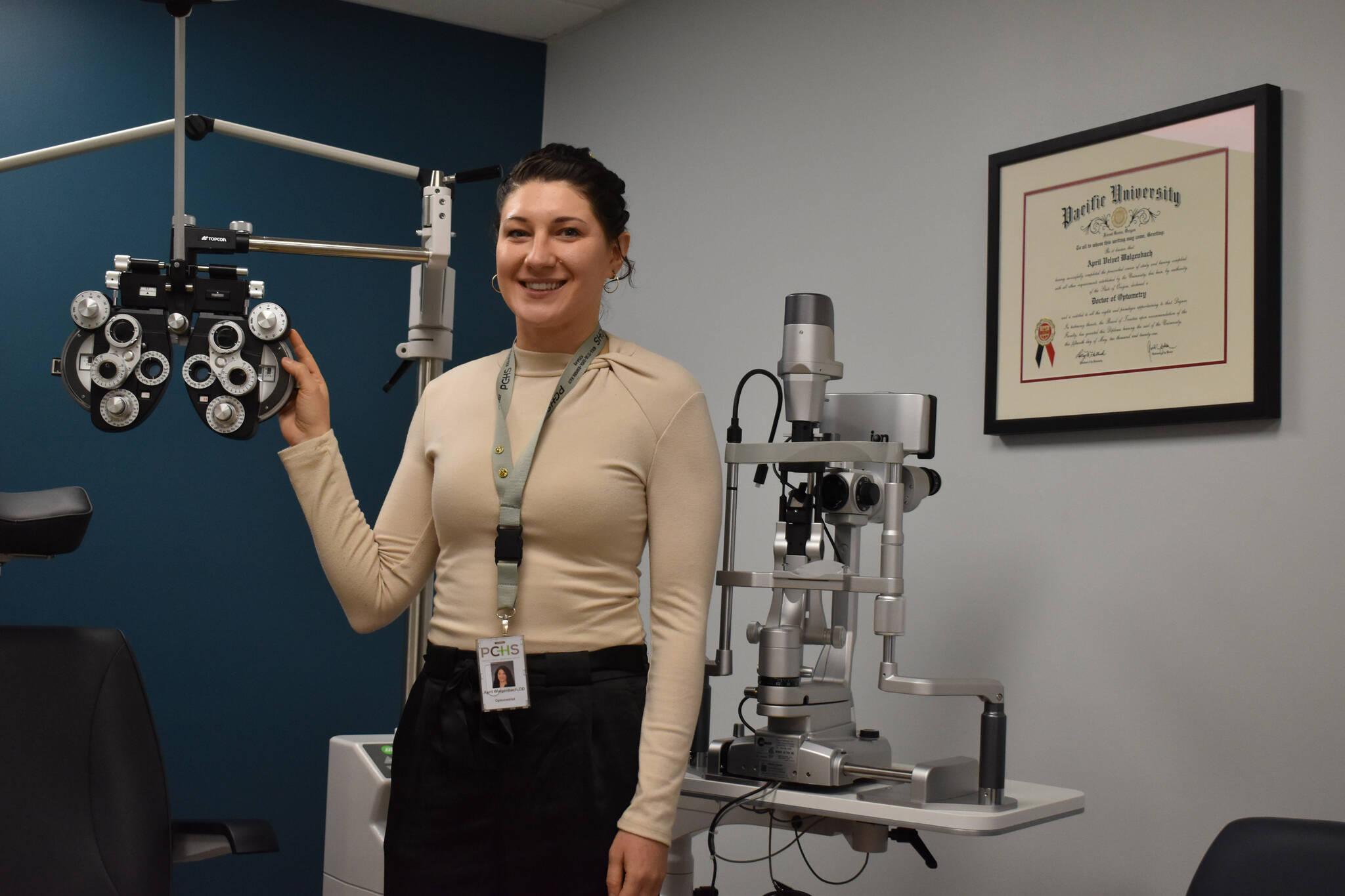 Dr. April Walgenbach stands in one of the examination rooms at Peninsula Community Health Services Eye Clinic in Soldotna, Alaska, on Thursday, Jan. 12, 2023. (Jake Dye/Peninsula Clarion)