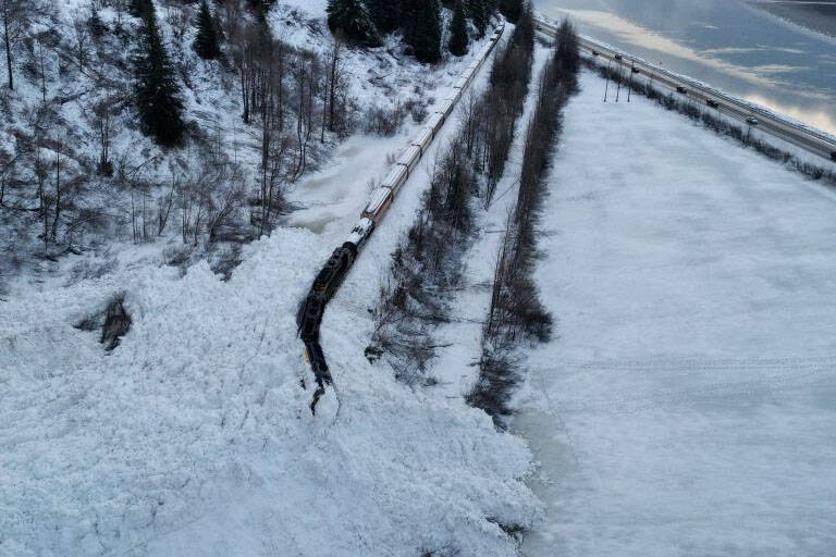 A train derailed by a large natural avalanche near Kern Creek is covered snow, Jan. 1, 2023, in Girdwood, Alaska. (Photo via Chugach Avalanche Center/Travis Smith)