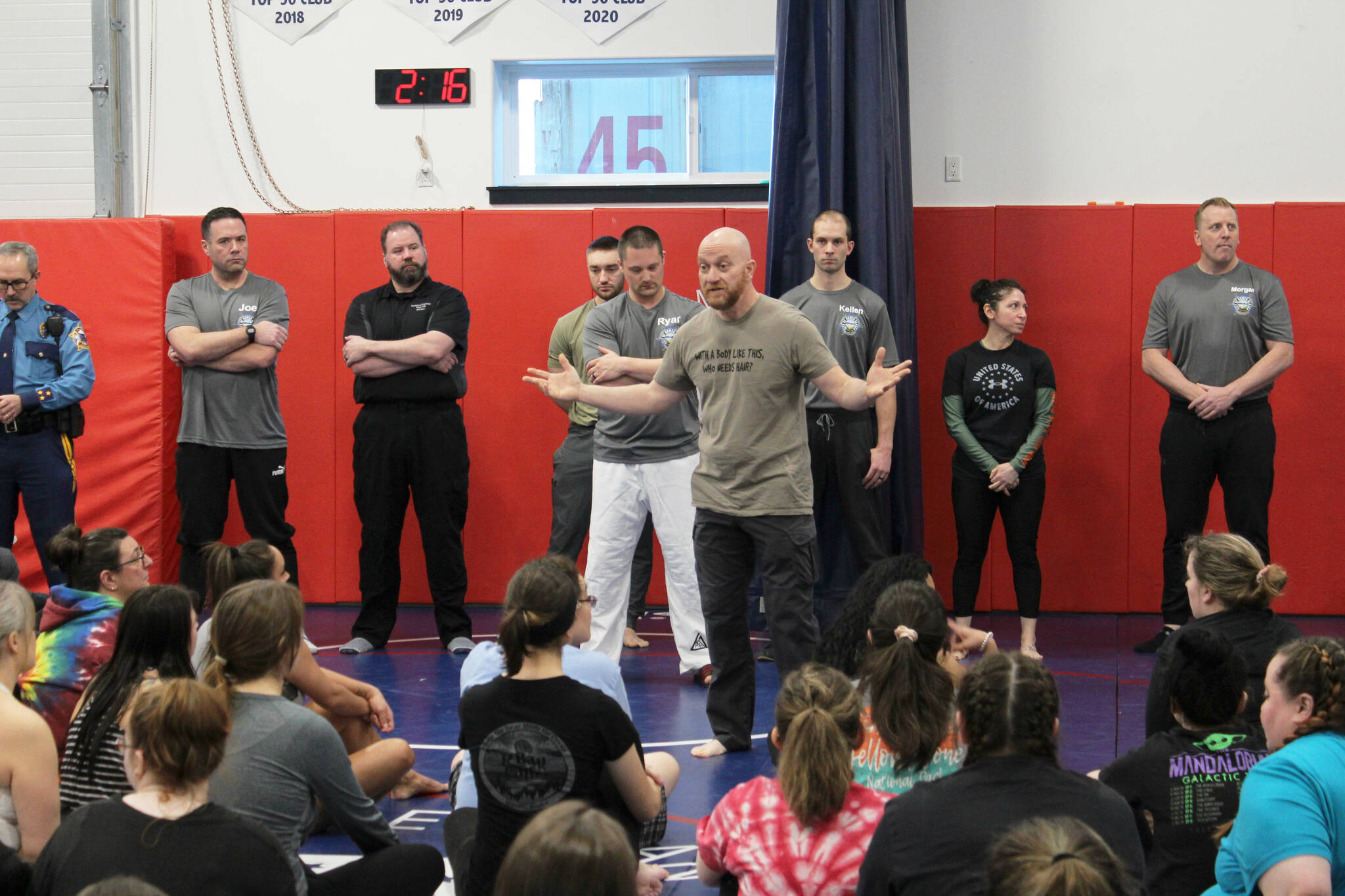Soldotna Police Chief Gene Meek (center) speaks to attendees during a “Toss A Cop” event at the All American Training Center on Saturday, Jan. 21, 2023, in Soldotna, Alaska. (Ashlyn O’Hara/Peninsula Clarion)