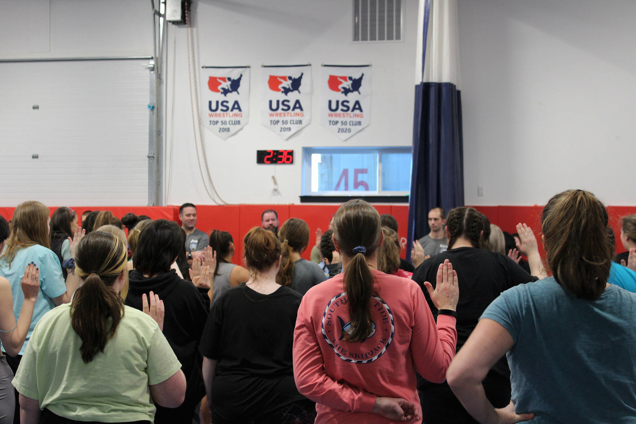 Women take an oath at a “Toss A Cop” event at the All American Training Center on Saturday, Jan. 21, 2023, in Soldotna, Alaska. (Ashlyn O’Hara/Peninsula Clarion)